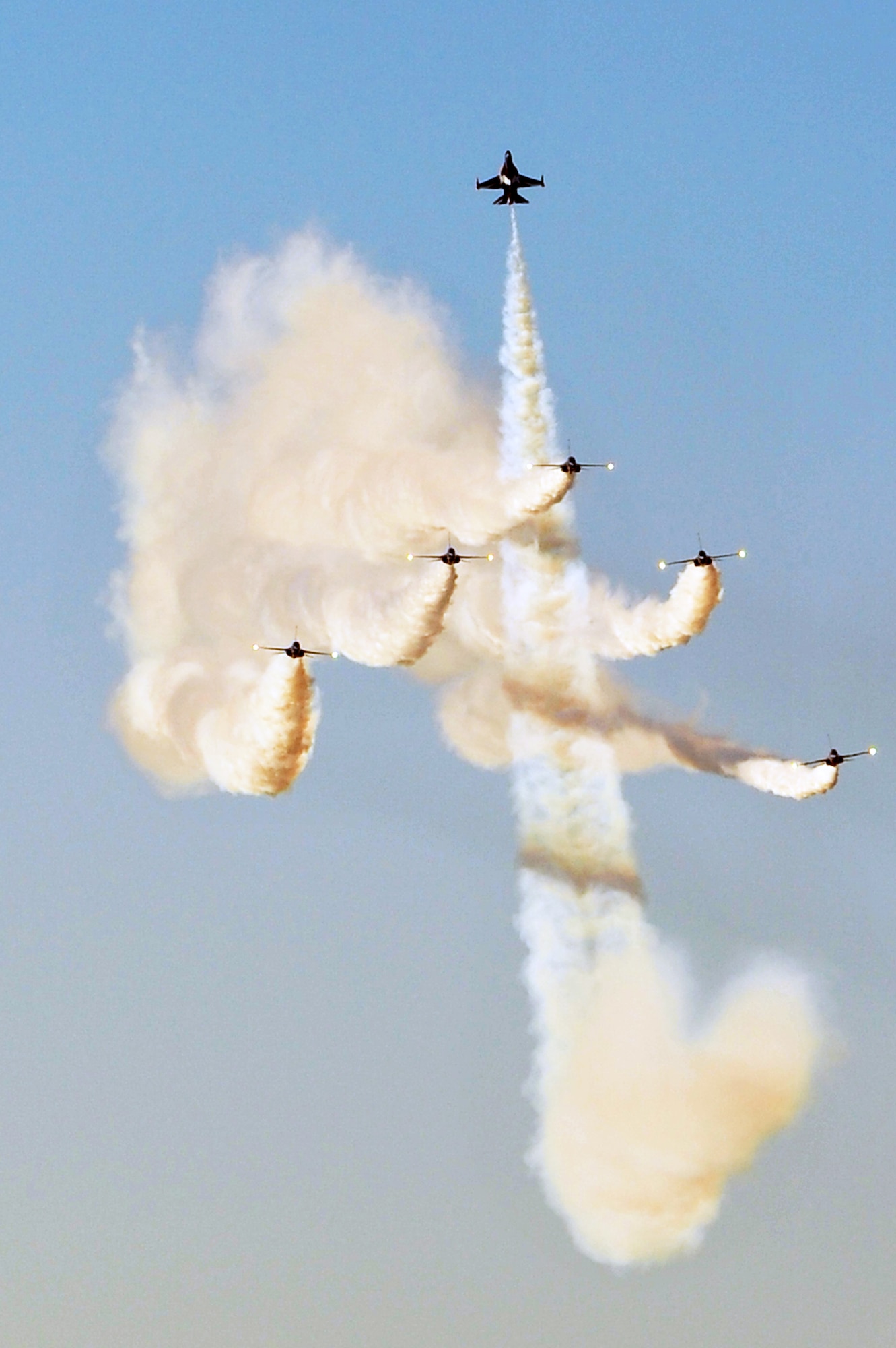 The Black Eagles perform aerial maneuvers over Osan Air Base Oct. 18, 2012, in preparation for Air Power Day Oct. 20-21, 2012. The team can perform up to 30 different types of acrobatics using T-50B training aircraft with supersonic capabilities. (U.S. Air Force photo/Staff Sgt. Stefanie Torres)