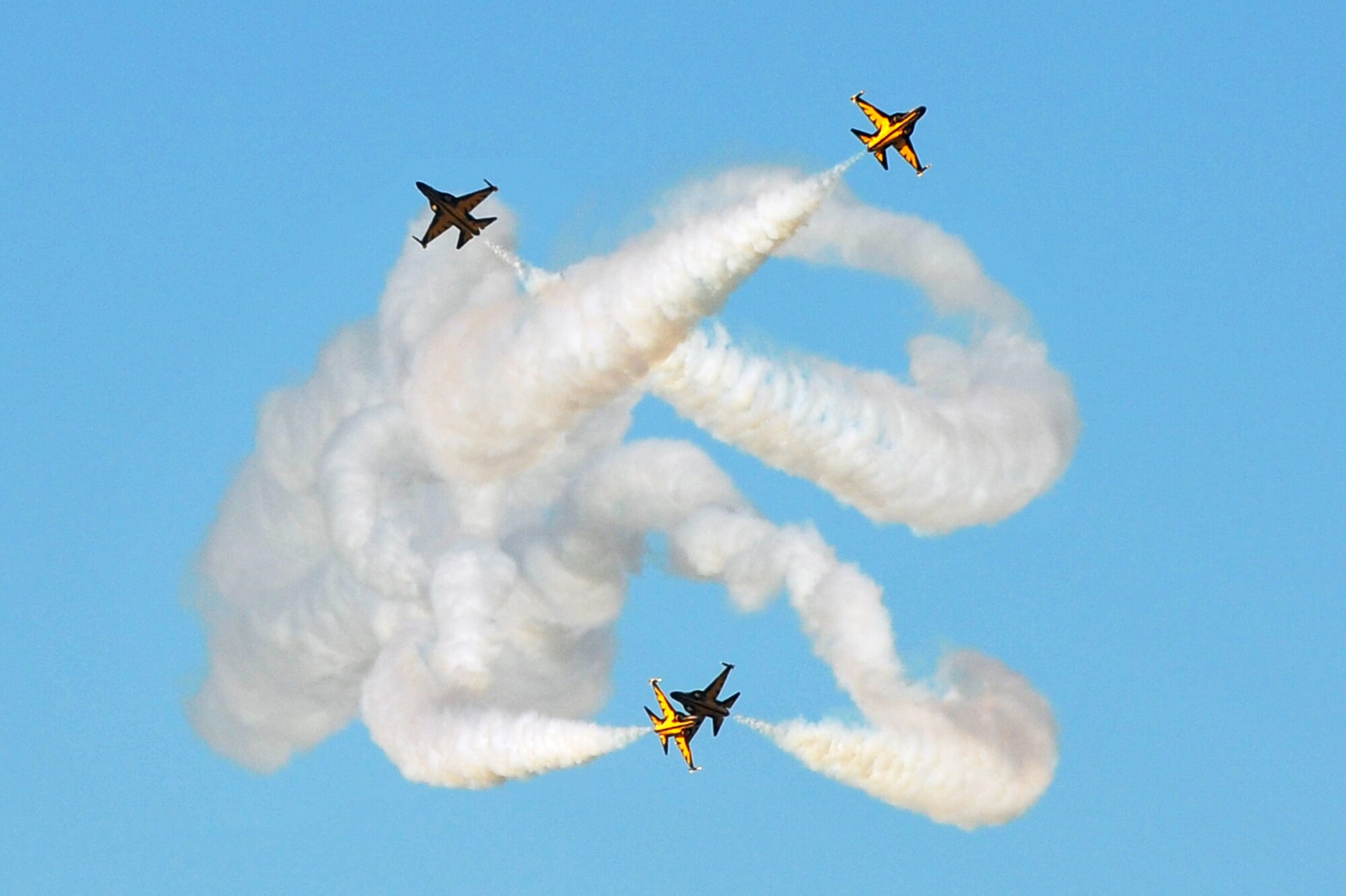 The Black Eagles perform aerial maneuvers over Osan Air Base Oct. 18, 2012, in preparation for Air Power Day Oct. 20-21, 2012. The team can perform up to 30 different types of acrobatics using T-50B training aircraft with supersonic capabilities. (U.S. Air Force photo/Staff Sgt. Stefanie Torres)