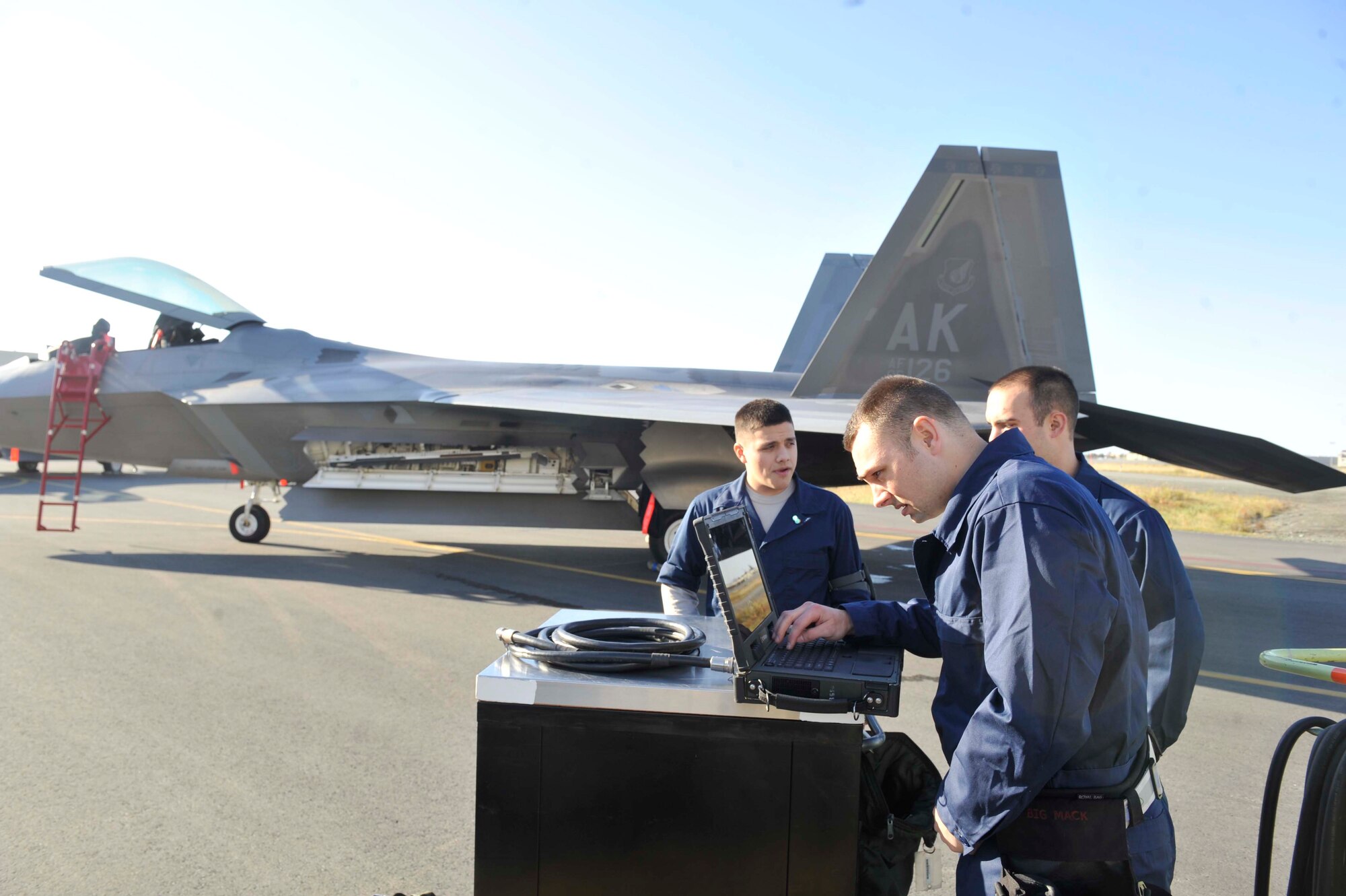JOINT BASE ELMENDORF-RICHARDSON, Alaska -- 525th and 477th Aircraft Maintenance Squadron members prepare for the annual load competition where two teams test their skills as load crew members for the F-22 Raptor aircraft. The load competition is an annual event held to demonstrate the skill level and knowledge of all Joint Base Elmendorf-Richardson aircraft maintenance including active duty and reserve airmen. (U.S. Air Force photo/ Airman Ty-Rico Lea