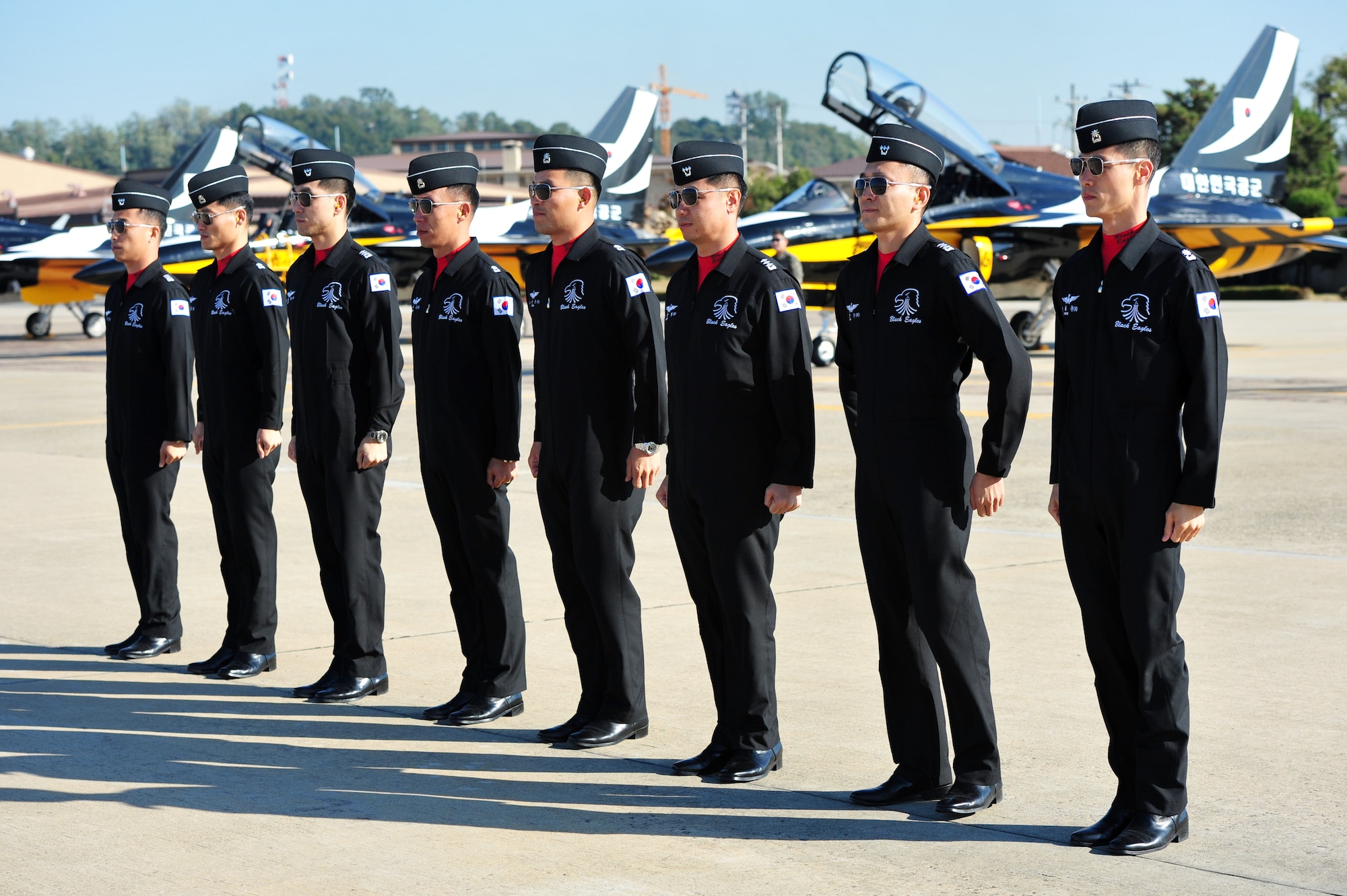 Pilots from the Republic of Korea’s aerial demonstration team, the Black Eagles, prepare for an airshow practice, Oct. 18, 2012, at Osan Air Base. The Black Eagles are preparing for Osan’s Air Power Day Oct. 20-21. 2012. (U.S. Air Force photo/Staff Sgt. Stefanie Torres)