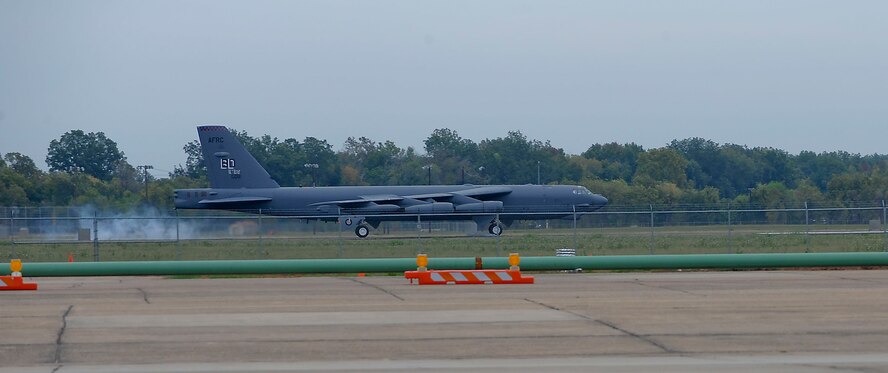 A B-52H Stratofortress lands during a touch-and-go on Barksdale Air Force Base, La., Oct. 16. In a conventional conflict, the B-52 can perform strategic attack, close-air support, air interdiction, offensive counter-air and maritime operations. The B-52 is the backbone of the bomber force with the ability for global attack and precision engagement. (U.S. Air Force photo/ Senior Airman Kristin High)(RELEASED)