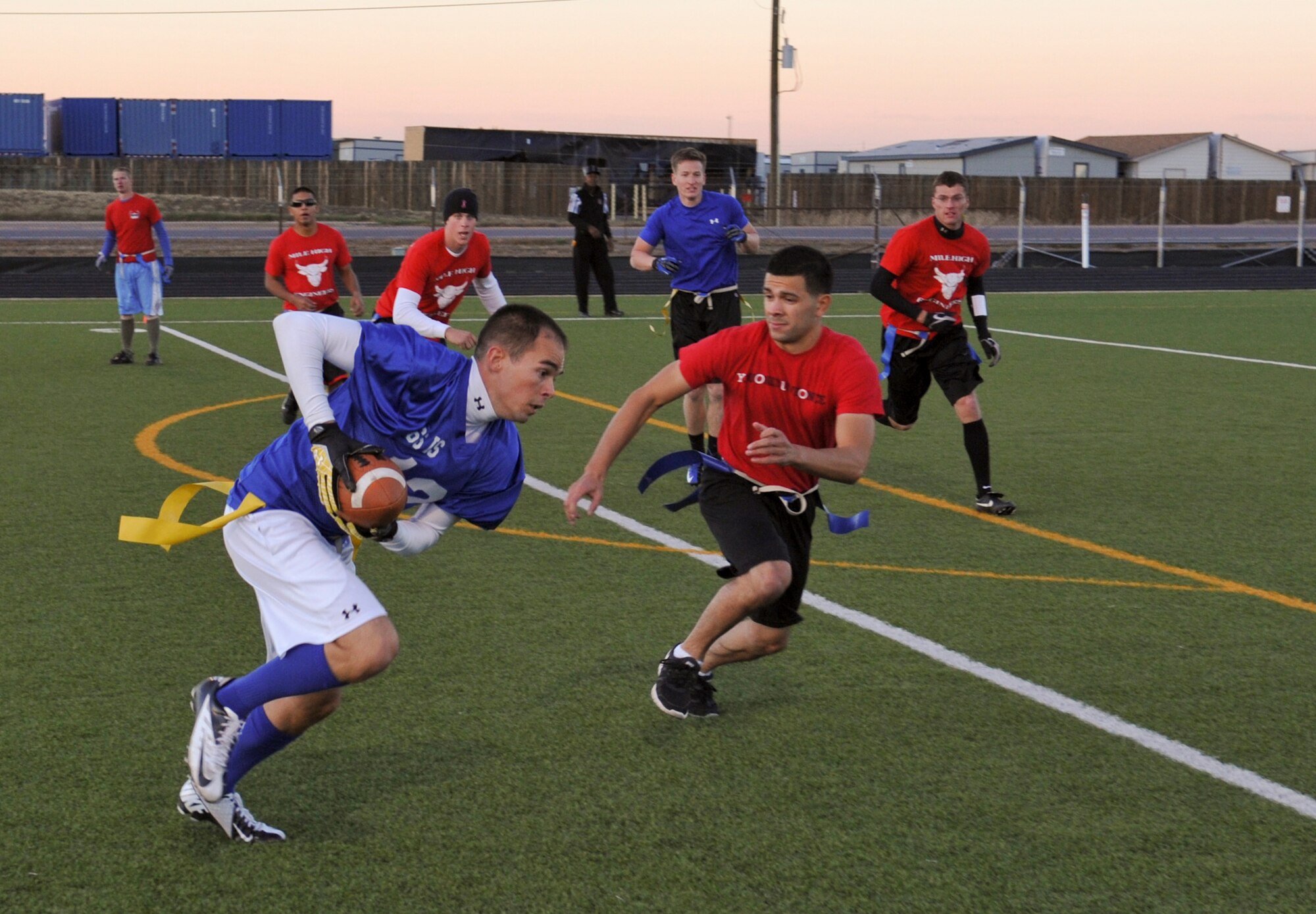 BUCKLEY AIR FORCE BASE, Colo. – Michael Garcia, 566th Intelligence Squadron, goes in for a touchdown against the 460th Civil Engineer Squadron during an intramural football game Oct. 17. 566 IS won the game with a score of 27-6 and improved their record to 7-4. (U.S. Air Force photo by Senior Airman Christopher Gross)