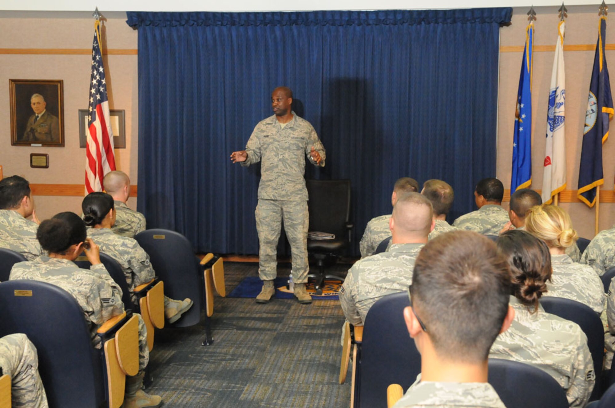 Chief Master Sgt. Jerry Moore, 11th Air Force command chief from Joint Base Elmendorf-Richardson, Alaska, speaks with Airmen Oct. 16 at the Binnicker Professional Military Education center on Joint Base Pearl Harbor-Hickam, Hawaii.  (U.S. Navy photo by David D. Underwood, Jr.)