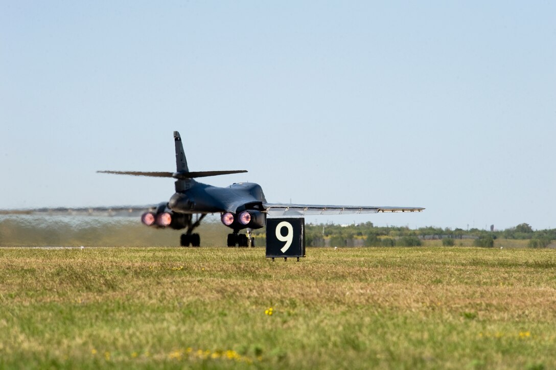 A B-1 Bomber from the 9th Bomb Squadron takes-off Oct. 17, 2012, during an Operational Readiness Exercise at Dyess Air Force Base, Texas. For three days Team Dyess was tested on their ability to deploy personnel and assets to a deployed location in support of combatant commanders during an ORE Oct. 15-17. During this exercise, known as a Phase I ORE, Dyess was evaluated on the wing’s ability to prepare and mobilize from peacetime readiness to a wartime posture on short notice. Areas evaluated included command and control, deployment processing, employment readiness, information operations and force protection. (U.S. Air Force photo by Airman 1st Class Damon Kasberg/ Released) 