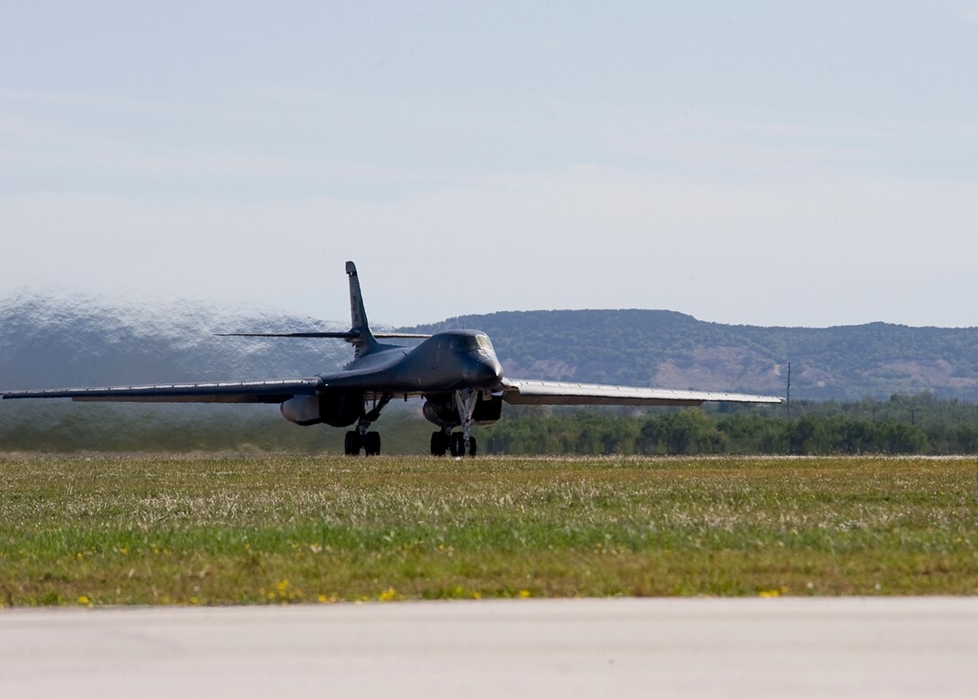 A B-1 Bomber from the 9th Bomb Squadron takes-off Oct. 17, 2012, during an Operational Readiness Exercise at Dyess Air Force Base, Texas. For three days Team Dyess was tested on their ability to deploy personnel and assets to a deployed location in support of combatant commanders during an ORE Oct. 15-17. During this exercise, known as a Phase I ORE, Dyess was evaluated on the wing’s ability to prepare and mobilize from peacetime readiness to a wartime posture on short notice. Areas evaluated included command and control, deployment processing, employment readiness, information operations and force protection. (U.S. Air Force photo by Airman 1st Class Damon Kasberg/ Released) 