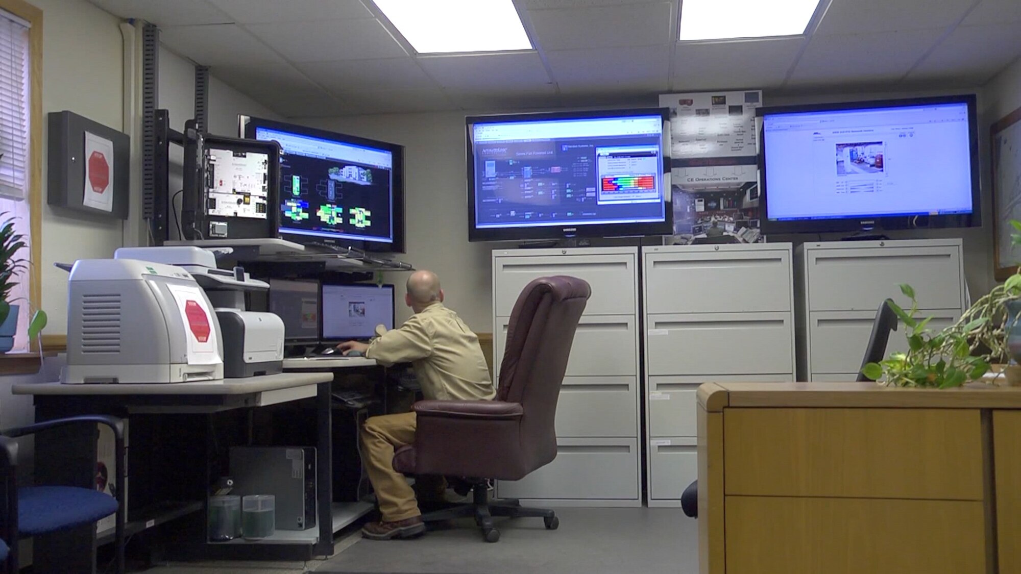 JBER, Alaska, uses a sophisticated energy management control system to monitor buildings and find energy savings. Currently the system saves the base over $500,000. (U.S. Air Force photo)