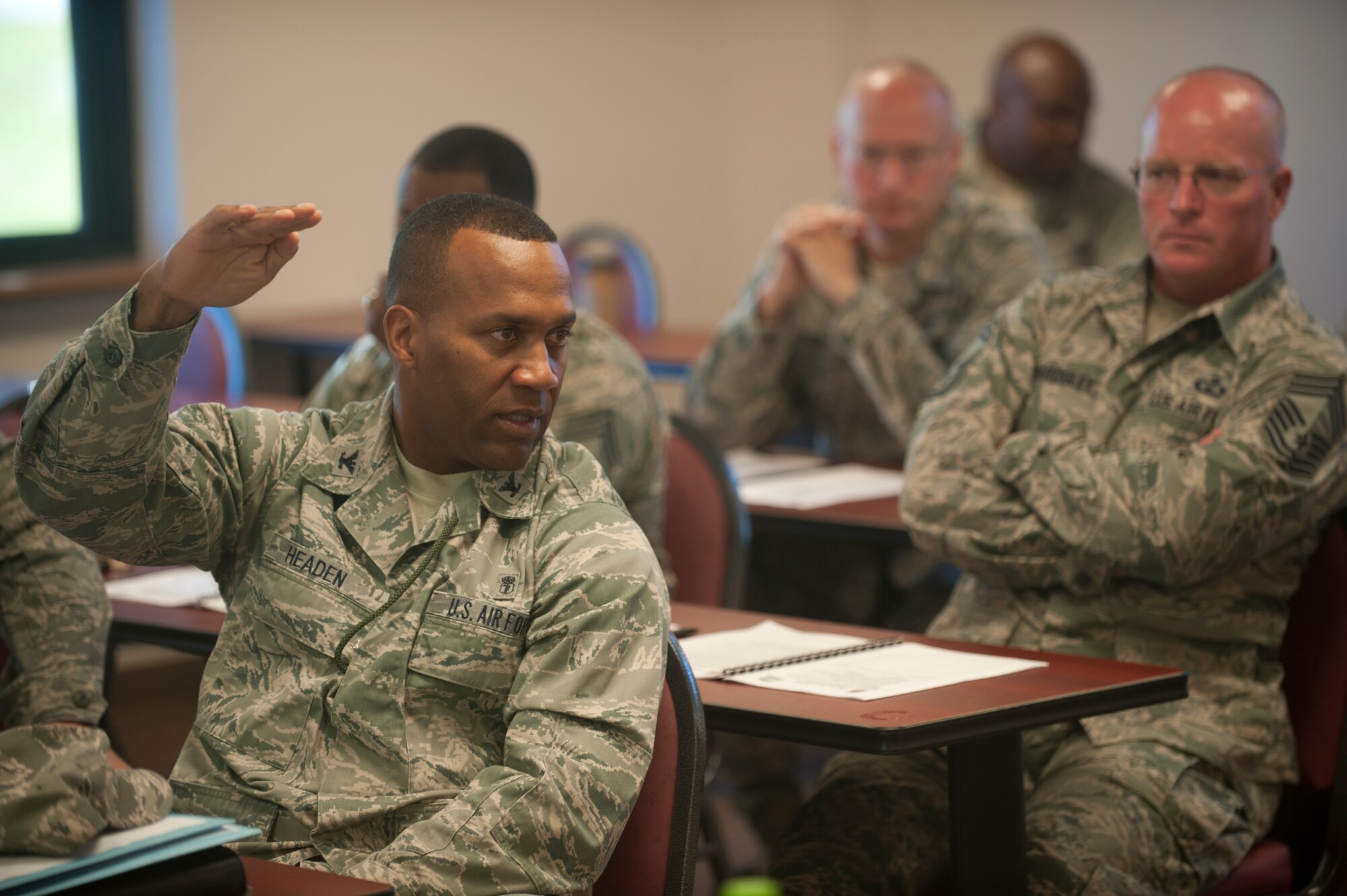 U.S. Air Force Col. Alvis Headen III, 23d Medical Group commander, discusses the status of today’s Air Force with other leadership at Moody Air Force Base, Ga., Oct. 18, 2012. Base leadership gathered during a three-day seminar to watch videos  and discuss resiliency and Air Force standards. (U.S. Air Force photo by Airman 1st Class Paul Francis/Released)
