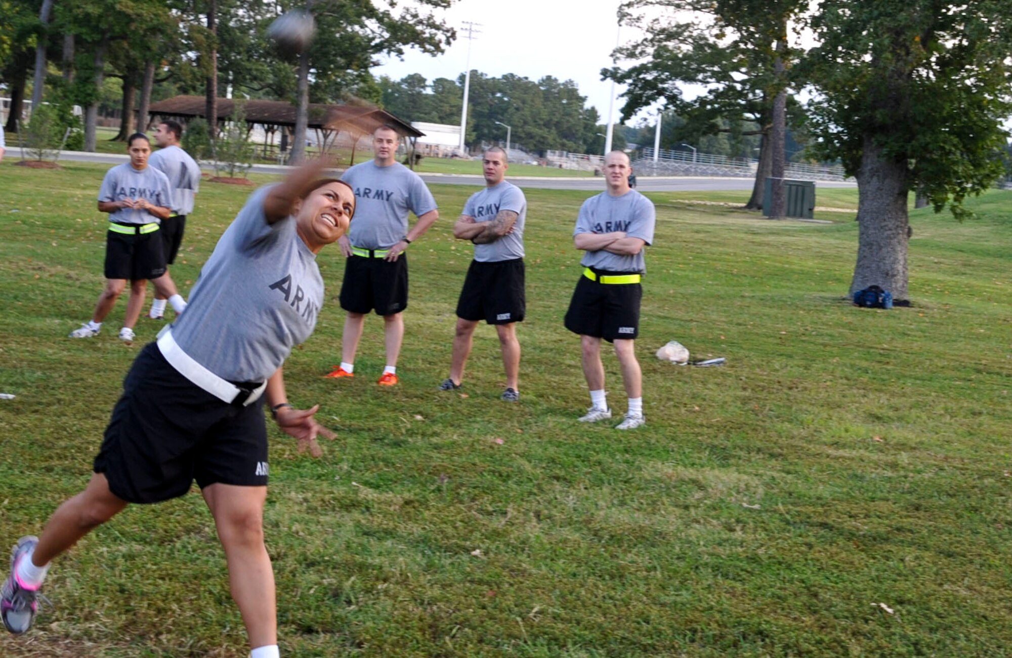 U.S. Army Capt. Cathrine Martinez, 53rd Transportation Battalion company commander, throws her shot put during a qualifying event for the German Armed Forces Badge for Proficiency at Fort Eustis, Va., Sept. 26, 2012. To earn the badge, Service members must complete a series of athletic events, including swimming, running and long/high jump, among others. (U.S. Air Force photo by Staff Sgt. Wesley Farnsworth/Released)