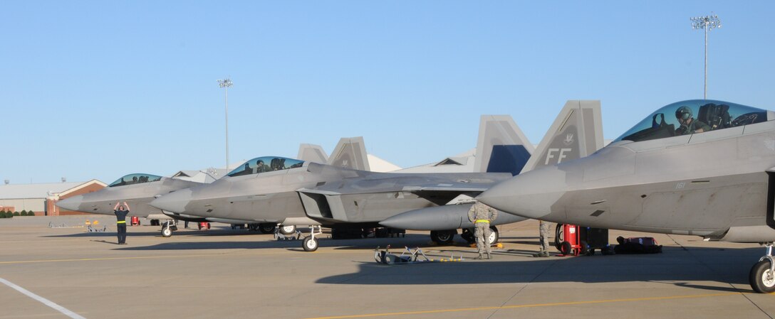 Langley AFB personnel and F-22 Raptors return from Japan
