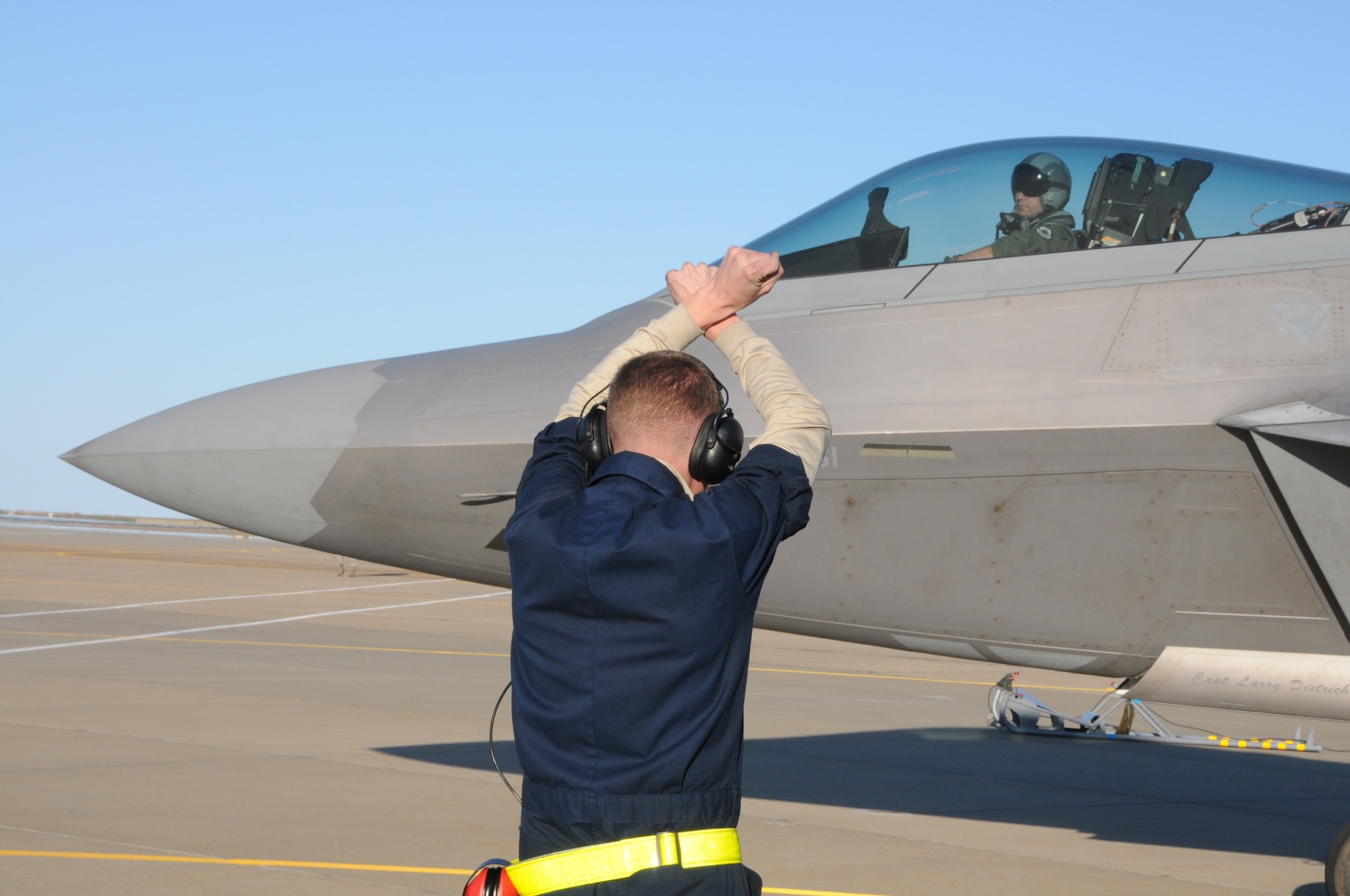 Langley AFB personnel and F-22 Raptors return from Japan
