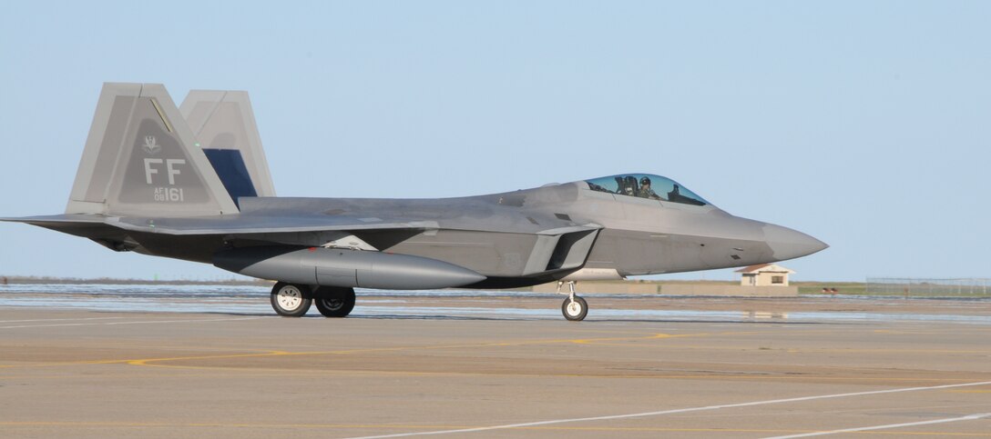 Langley AFB personnel and F-22 Raptors return from Japan