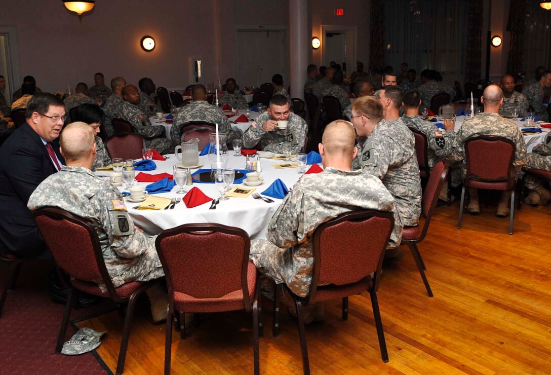 Soldiers enjoy breakfast at the Fort Eustis Club during the annual prayer breakfast, Oct. 17, 2012. The breakfast is held to show Soldiers the chapel is there for them as well as enrich their spiritual fitness. (U.S. Air Force photo by Staff Sgt. Wesley Farnsworth / Released) 