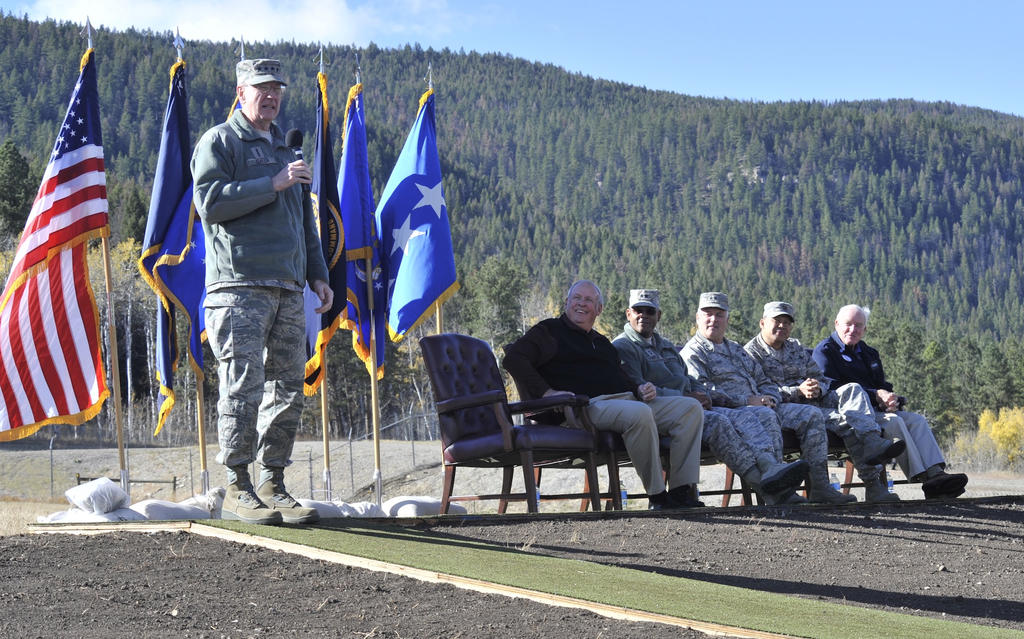 Gen. C. Robert Kehler, USSTRATCOM commander, was the final speaker at the 50th Anniversary celebration on Oct. 13. Also pictured are the other guest speakers from left to right retired Gen. Lance Lord, Association of Air Force Missileers president; Maj. Gen. Everett Thomas, Air Force Global Strike Command vice commander; Maj. Gen. Michael Carey, 20th Air Force commander; Col. H.B. Brual, 341st Missile Wing commander; and retired Col. Charles Simpson, AAFM event representative. (U.S. Air Force photo/ John Turner)