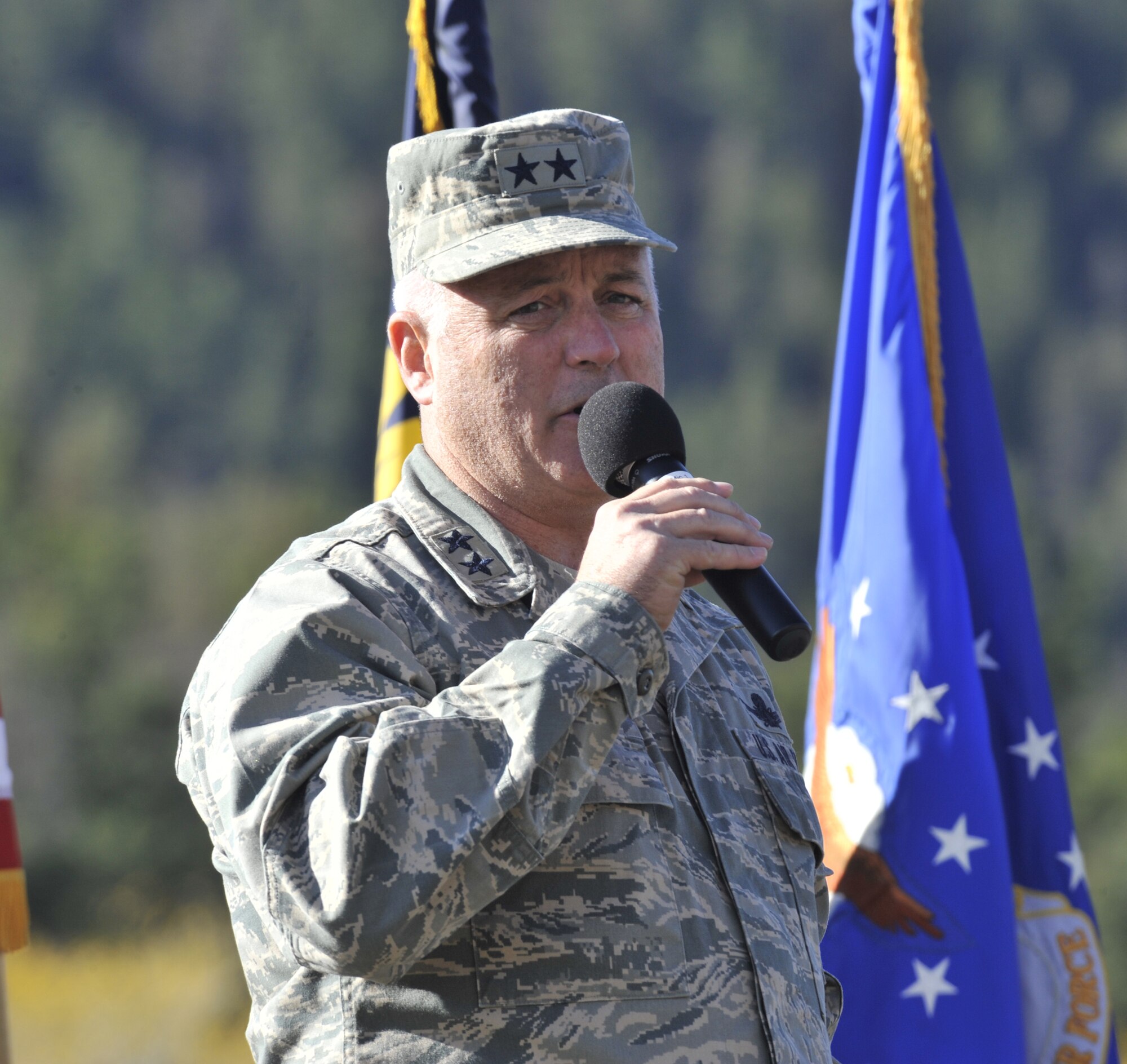 Maj. Gen. Michael Carey, 20th Air Force commander, addresses the hundreds gathered at A-06 launch facility on Oct. 13 to celebrate the 50th Anniversary of the first Minuteman Missile being on alert in support of the Cuban Missile Crisis. All three missile wings – the 341st at Malmstrom, the 90th at F.E. Warren Air Force Base, Wyo., and the 91st at Minot AFB, N.D. – fall under his command. (U.S. Air Force photo/John Turner)