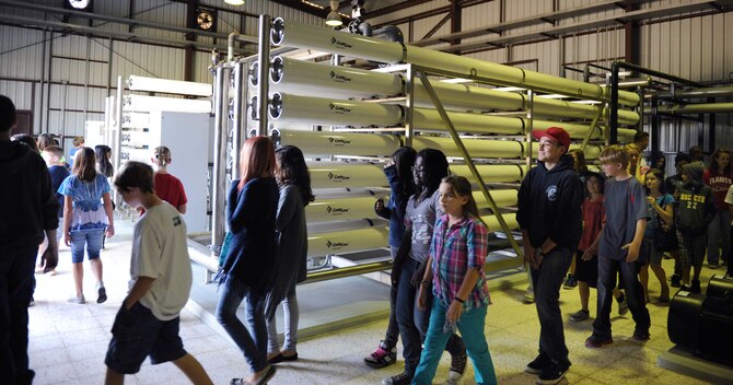 Sixth and seventh-graders from the Incirlik Unit School, take a tour of the water treatment facility Oct. 16, 2012, at Incirlik Air Base, Turkey. The children learned that almost 1,000 gallons of water is used per person per day on base. This includes drinking water, showers, watering yards and washing dishes. (U.S. Air Force photo by Senior Airman Anthony Sanchelli/Released)