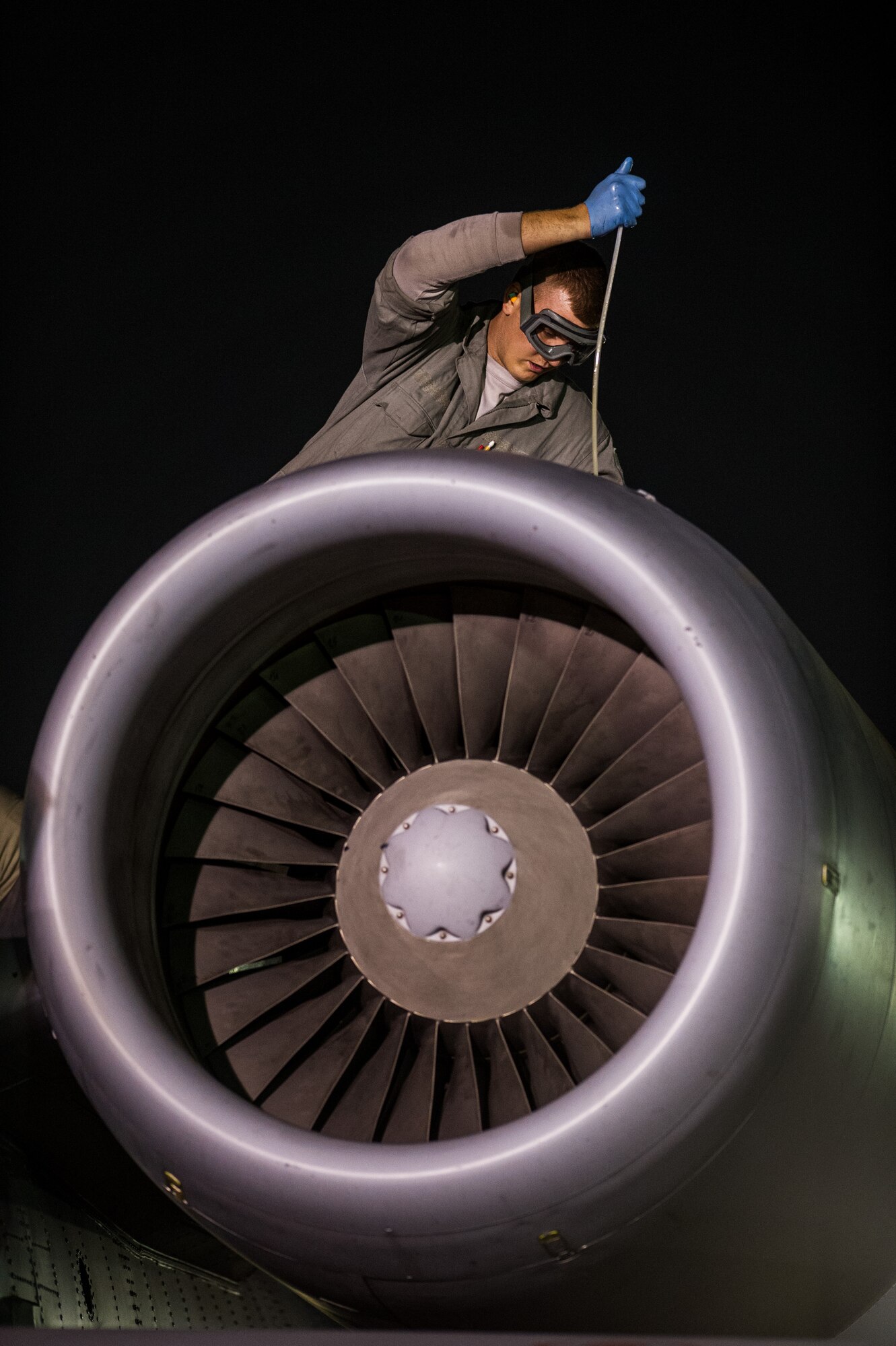 SrA Alexander Dean, 455th Expeditionary Aircraft Maintenance Squadron, crew chief, performs routine maintenance on an A-10 Thunderbolt II assigned to the 354th Expeditionary Fighter Squadron on Oct. 16, 2012, Bagram Airfield, Afghanistan. Bagram maintainers work around the clock to keep their “Warthogs” ready to fly close air support missions in support of coalition ground forces. Dean hometown is Irving, N.Y. (U.S. Air Force photo/ Staff Sgt. Jonathan Snyder)