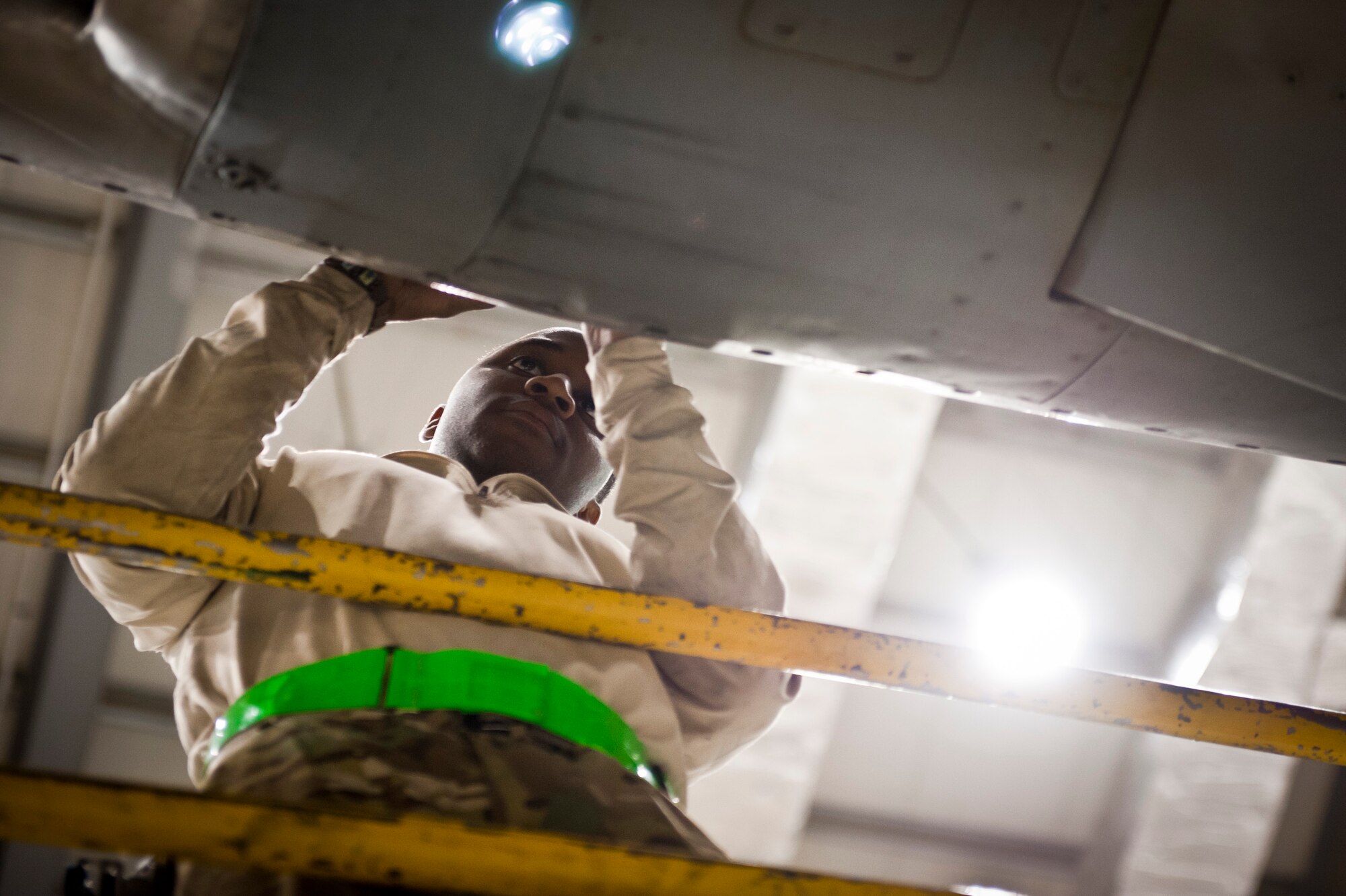 A1C Akeem Jackson, a maintainer with the 455th Expeditionary Aircraft Maintenance Squadron from New York City, examines an engine on a U.S. Air Force C-130 Hercules during a comprehensive aircraft inspection at Bagram Airfield, Afghanistan Oct. 17, 2012. Jackson and his fellow maintainers are entrusted with keeping Bagram’s Hercules fleet in peak condition. (U.S. Air Force Photo/Capt. Raymond Geoffroy)
