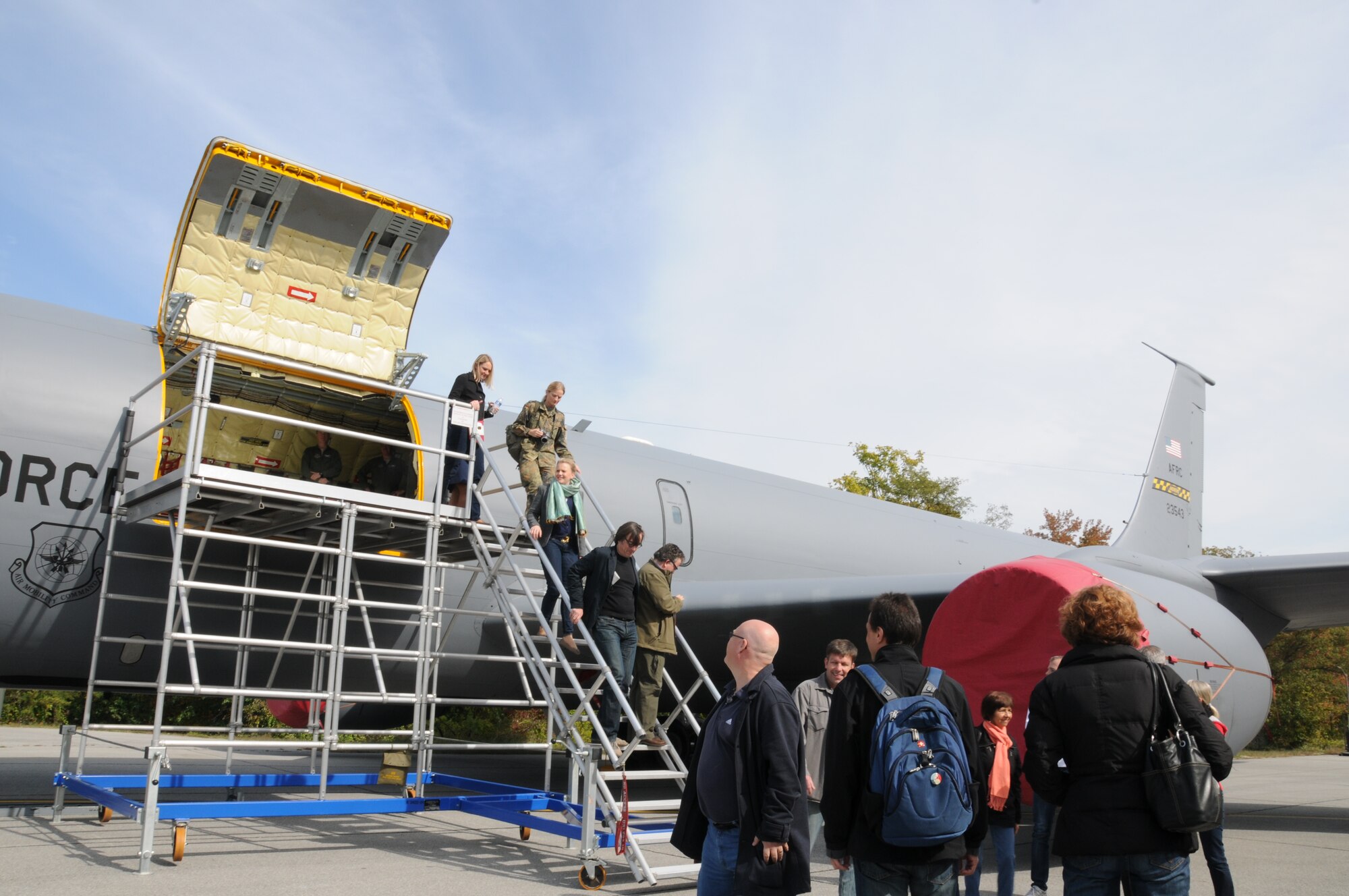 Members of the Federal Republic of Germany, Washington D.C., tour a KC-135 Stratotanker during a visit to Joint Base Andrews, Md., Oct. 17. The visit included a base tour, demonstrations from the 11th Wing Security Force’s working dog team, The U.S. Air Force Honor Guard Drill Team, The U.S. Air Force Band Max Impact and aircraft displays from the 459th ARW, 1st Helicopter Squadron and the 113th Wing. The German Embassy goes out into the community each year and their visits rotate between the different branches of the embassy. This year, the embassy's military branch had the distinct privilege of hosting. (U.S. Air Force photo/ Senior Airman Katie Spencer)