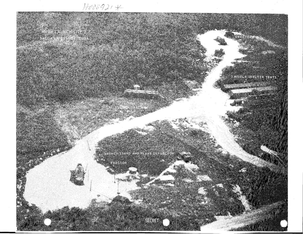 National Photographic Interpretation Center imagery kept President John F. Kennedy updated on progress made by the Soviets on their missile site in Cuba. This Oct. 25, 1962, image shows all the elements necessary to launch a missile with a 1,100 nautical mile range. Analysts could tell by the tracks in the ground leading to one of the missile shelter tents that a weapon in a high state of readiness was present. The image also demonstrated the Soviets’ extensive use of canvas to camouflage its weapons components and, therefore, its intentions. Photo courtesy of National Geospatial-Intelligence Agency