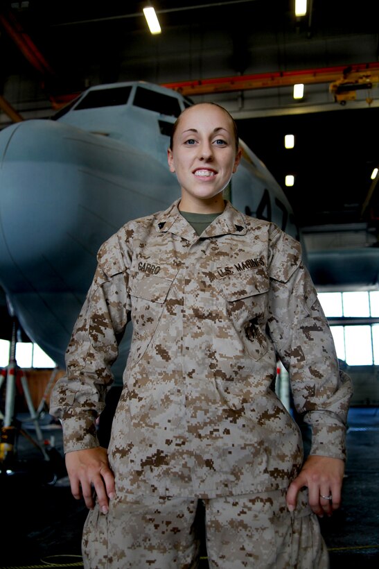 Cpl. Siobhan Garro, an aircraft maintenance administration specialist with Marine Aerial Refueler Transport Squadron 252 and native of Tampa, Fla., uses the global management and optimal administrative maintenance activity servers to turn information given to her by pilots, crew chiefs, mechanics and other personnel into useful logs and archives.