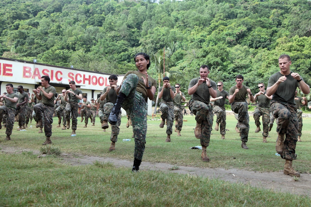 Philippine and U.S. Marines participate in a Philippine Marine Corps martial arts program class during PHIBLEX 2013 at the Philippine Marine Corps Training Center Basic School in Ternate, Cavite, Republic of the Philippines, Oct. 13.