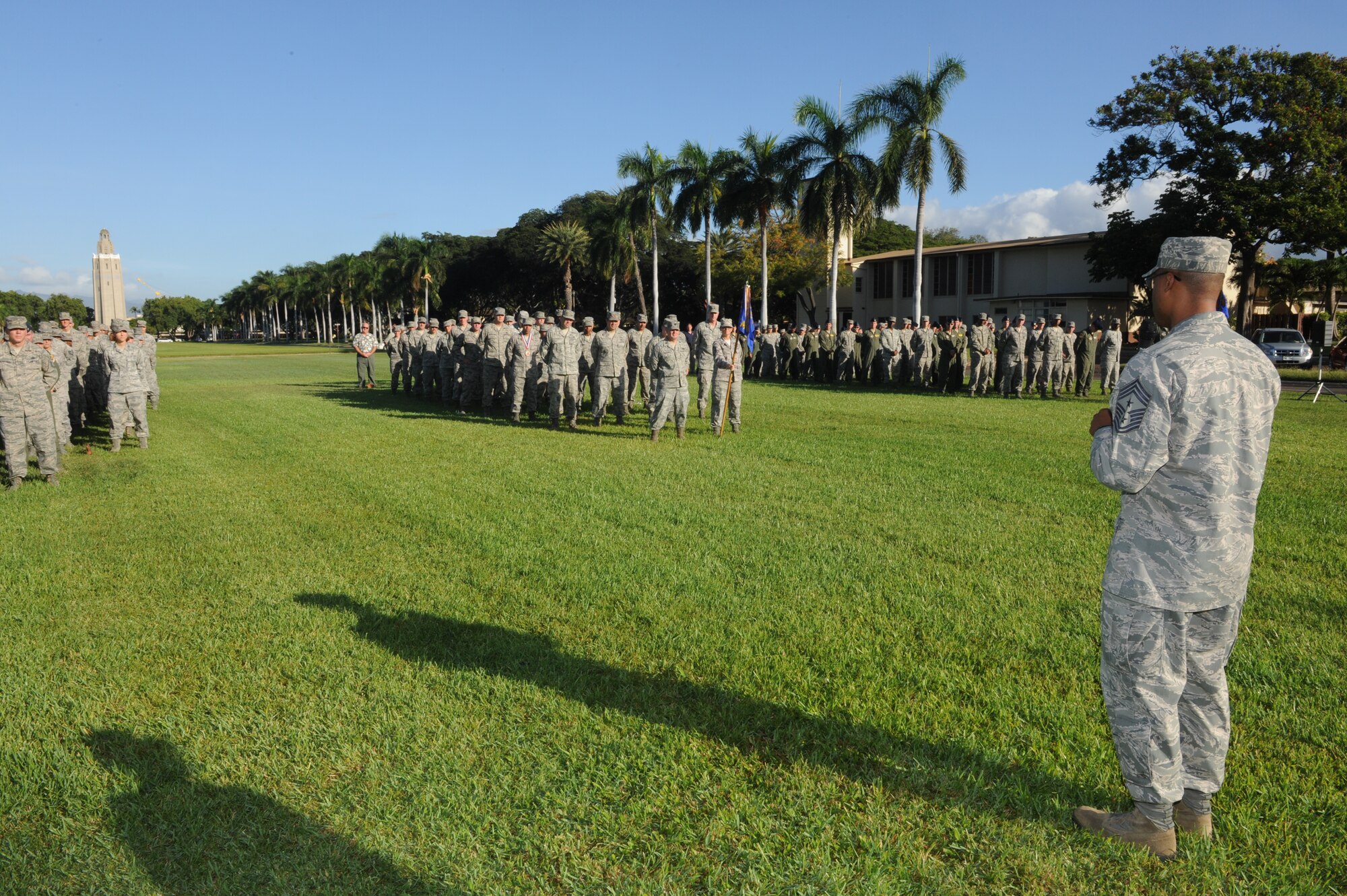 Chief Master Sgt. Leslie Bramlett, 15th Wing command chief, speaks to Airmen during the 15th Wing Quarterly Awards ceremony Oct. 19 at Hickam Mall on Joint Base Pearl Harbor-Hickam, Hawaii. During the ceremony, eight individuals and one team were recognized for their service to the wing and the U.S. Air Force. (U.S. Air Force photo by Staff Sgt. Nathan Allen)
