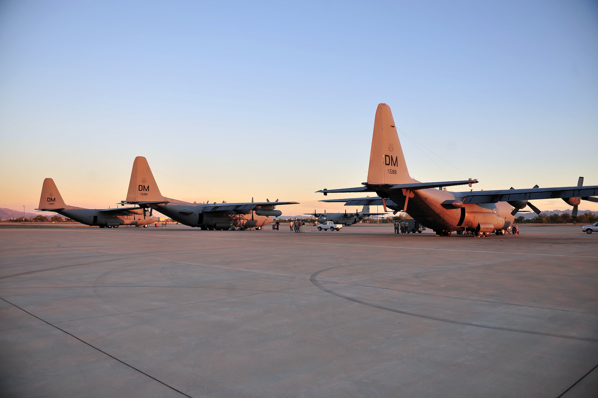 U.S. Air Force EC-130H’s from the 41st Electronic Combat Squadron get worked on in preparation for night flights on Davis-Monthan Air Force Base, Ariz., Oct.15, 2012.The EC-130H is flown by both the 41st and 43rd ECS. (U.S. Air Force photo by Airman 1st Class Josh Slavin/Released)