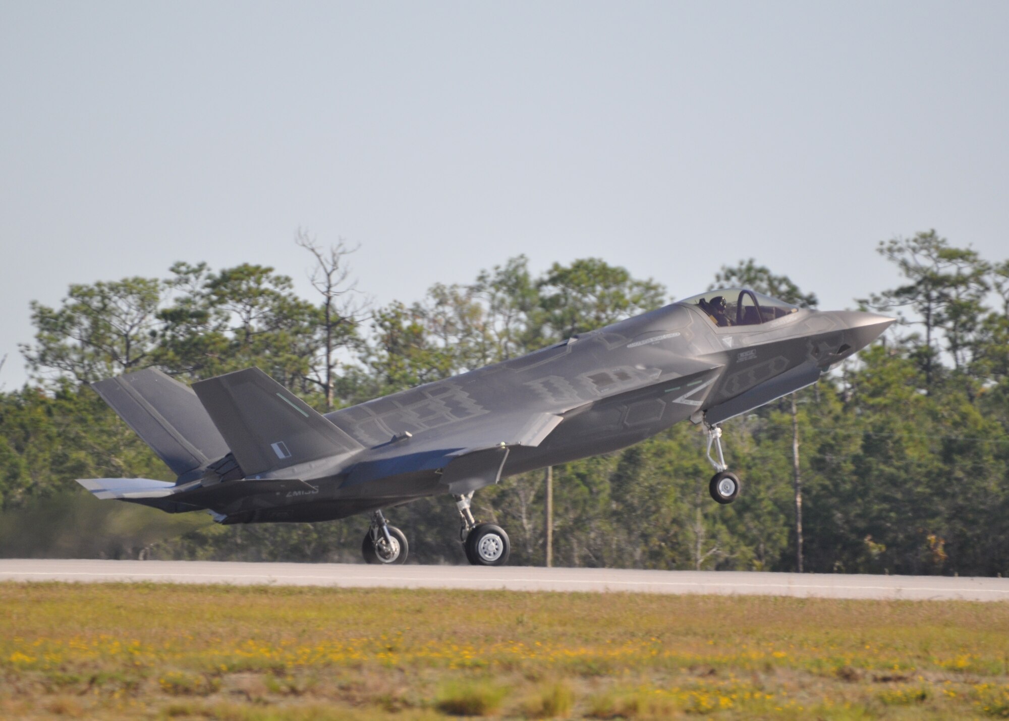 A second British F-35B Lightning II arrives at Eglin Air Force Base, Fla., from Naval Air Station Fort Worth Joint Reserve Base, Texas, increasing the capability for pilot and maintenance training. The first class of United Kingdom Royal Air Force and Royal Navy aircraft maintainers attending courses at the F-35 Academic Training Center met the jet flown by U.K. Royal Air Force Sqn. Ldr. Jim Schofield. The U.K. aircraft are imbedded in the Marine Fighter Attack Training Squadron 501, and are used by both countries to conduct F-35 training. Accompanied by a U.S. F-35B, there are now 13 B variants of the joint strike fighter at the Marine squadron. Combined with the nine A variants flown by the Air Force, Eglin is the largest fleet of F-35s in the world. Later this month, an RAF and RN pilot will begin instructor pilot training, making them the first international pilots trained at Eglin on the fifth-generation, multi-role fighter.[U.S. Air Force photo/Maj. Karen Roganov]