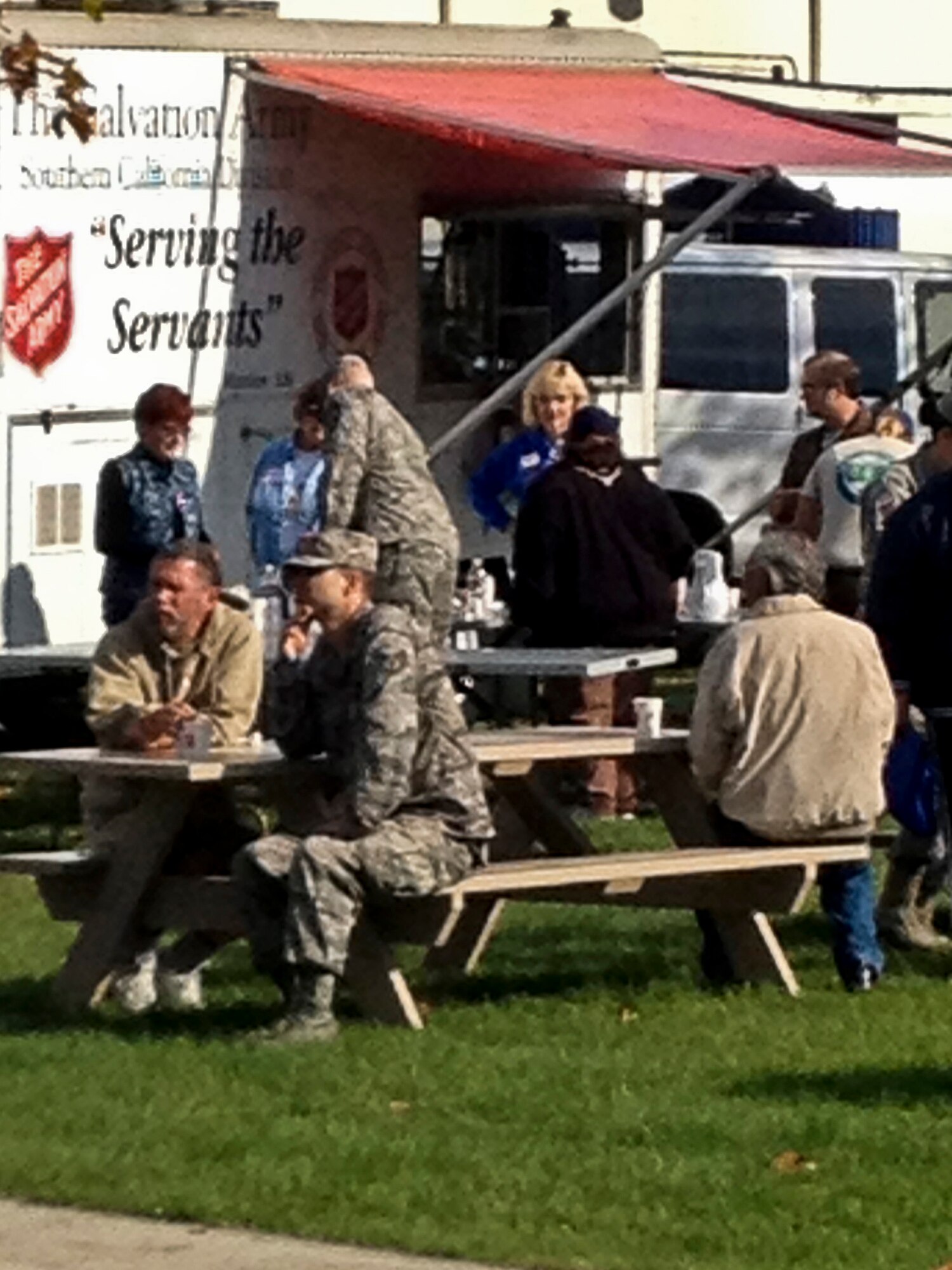 SANTA MARIA, Calif. – Team Vandenberg Airmen escort local veterans during the Santa Barbara County Veterans Stand Down at the Santa Maria Fairgrounds Saturday, Oct. 13, 2012. The Veterans Stand Down was organized to provide a single place for homeless and nearly-homeless veterans to receive a wide variety of personal assistance. At least 250 veterans benefited from the services which included hot showers, haircuts, new clothing, medical and dental check-ups, financial assistance, legal services, family support, Department of Veterans Affairs information and much more. More than 80 Airmen from Vandenberg Air Force Base volunteered to work the event. (U.S. Air Force photo/Lawrence Hill)