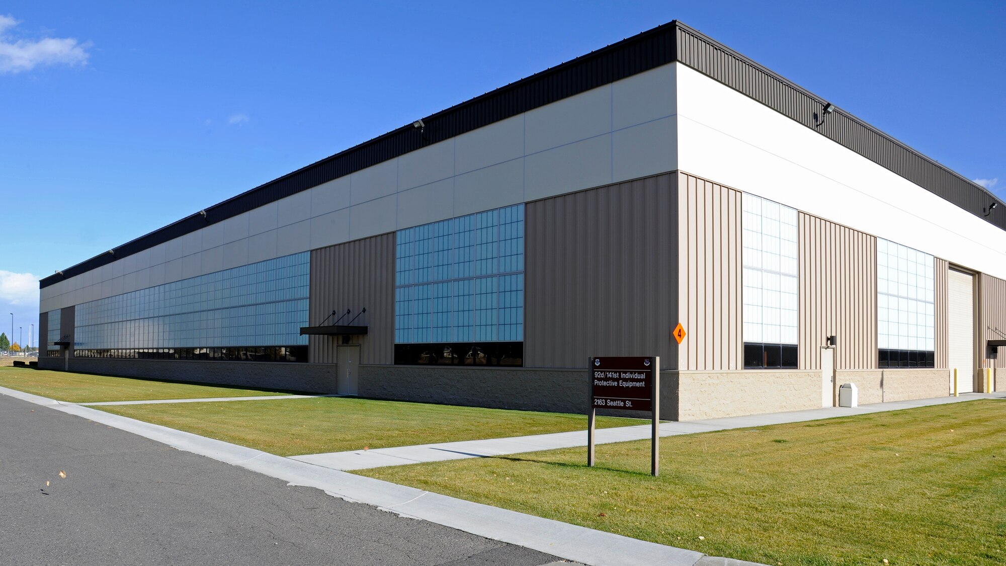 An exterior view of the “Glasshouse” at Fairchild Air Force Base, Wash., Oct. 16, 2012. The entrance to the Envision Store, now currently located inside the “Glasshouse” is located on the north side of the building.  (U.S. Air Force photo by Airman 1st Class Ryan Zeski)