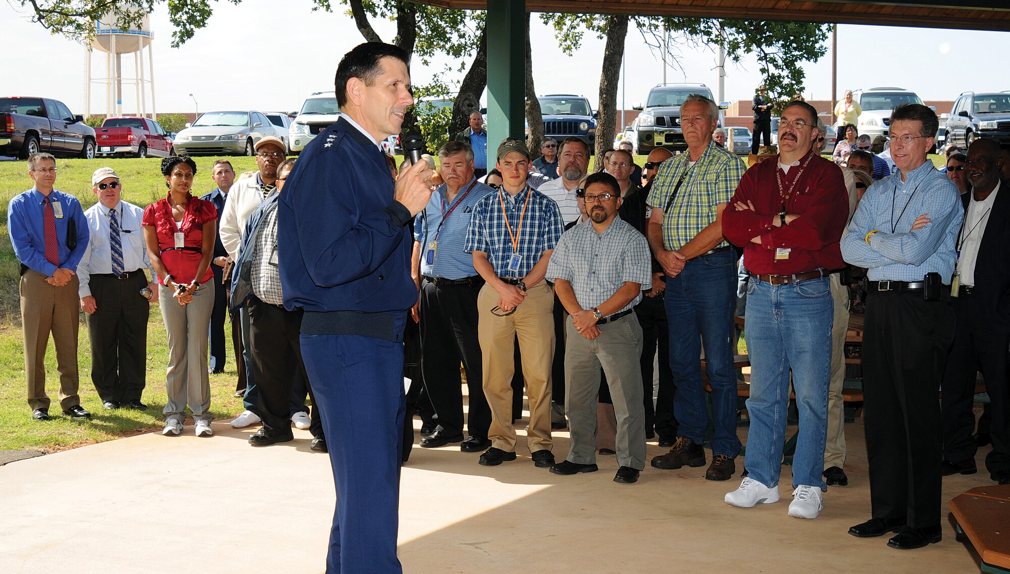 Lt. Gen. C.D. Moore II, commander of the Air Force Life Cycle Management Center at Wright-Patterson AFB, Ohio, talks briefly about his years of flying Air Force jets, the engines that powered them and the importance of what the workers do here as he joined in the celebration of the Propulsion Management Directorate stand up Oct. 10. Tinker personnel welcomed the general to the AFLCMC/LP festivities in the pavilion near Bldg. 3001 during his Oct. 9 and 10 Tinker visit. (Air Force photo by Margo Wright)