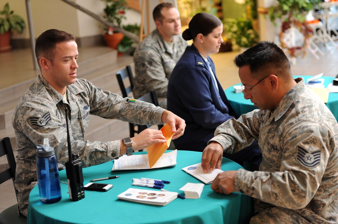 Tech. Sgt. Jaime Torres, 28th Medical Support Squadron NCO in charge of medical maintenance, registers to donate marrow during a Department of Defense Bone Marrow Donor Program registration drive in the Exchange lobby at Ellsworth Air Force Base, S.D., Oct. 15, 2012. Ellsworth Airmen and their families came from all across the base to register in an effort to find life-saving marrow matches for those suffering from fatal diseases. (U.S. Air Force photo by Airman 1st Class Hrair H. Palyan/Released)