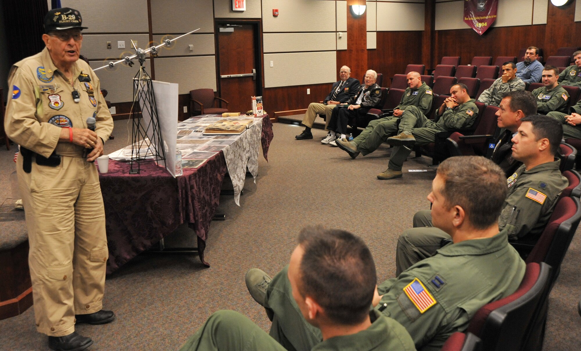 Charles Chauncey, U.S. Army Air Corps B-29 combat pilot, shares his stories from World War II with more than 60 McConnell Airmen at the 384th Air Refueling Squadron auditorium Oct. 18, 2012, McConnell Air Force Base, Kan.  Chauncey flew more than 35 combat missions over Japan during WWII.  (U.S. Air Force photo/Staff Sgt. Abigail Klein)