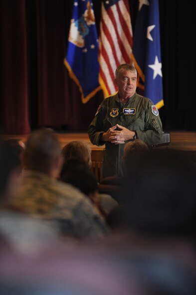 MINOT AIR FORCE BASE, N.D. -- Lt. Gen. Thomas W. Travis, U.S. Air Force Surgeon General, briefs members of the 5th Medical Group on the Air Force's Medical Service mission and vision during an all-call held at the base theater, Oct. 5. The general addressed the future medical challenges in the Air Force medical mission, as well as other high-interest Air Force medical Service topics and goals. (U.S. Air Force photo/Senior Airman Jesse Lopez)