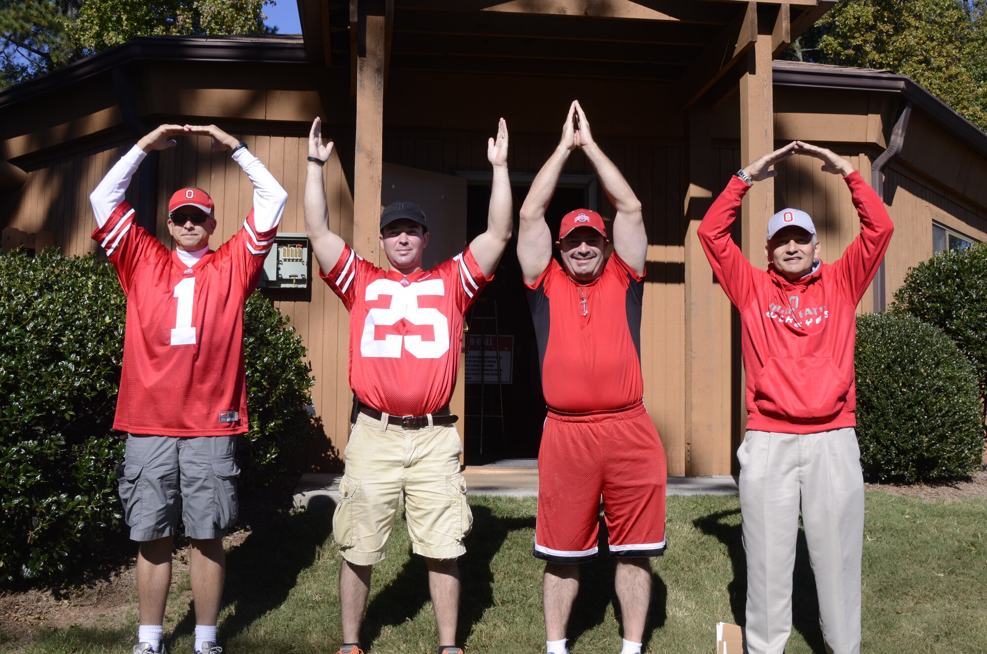 Ohio State fans opened up the team day games with a demonstration of Ohio State education in college football fashion at the Annual 94th Airlift Wing Team Day at Dobbins Air Reserve Base, Ga., Oct. 16. Team day is designed to promote team work and competitive spirit between units. (U.S. Air Force photo/Don Peek)