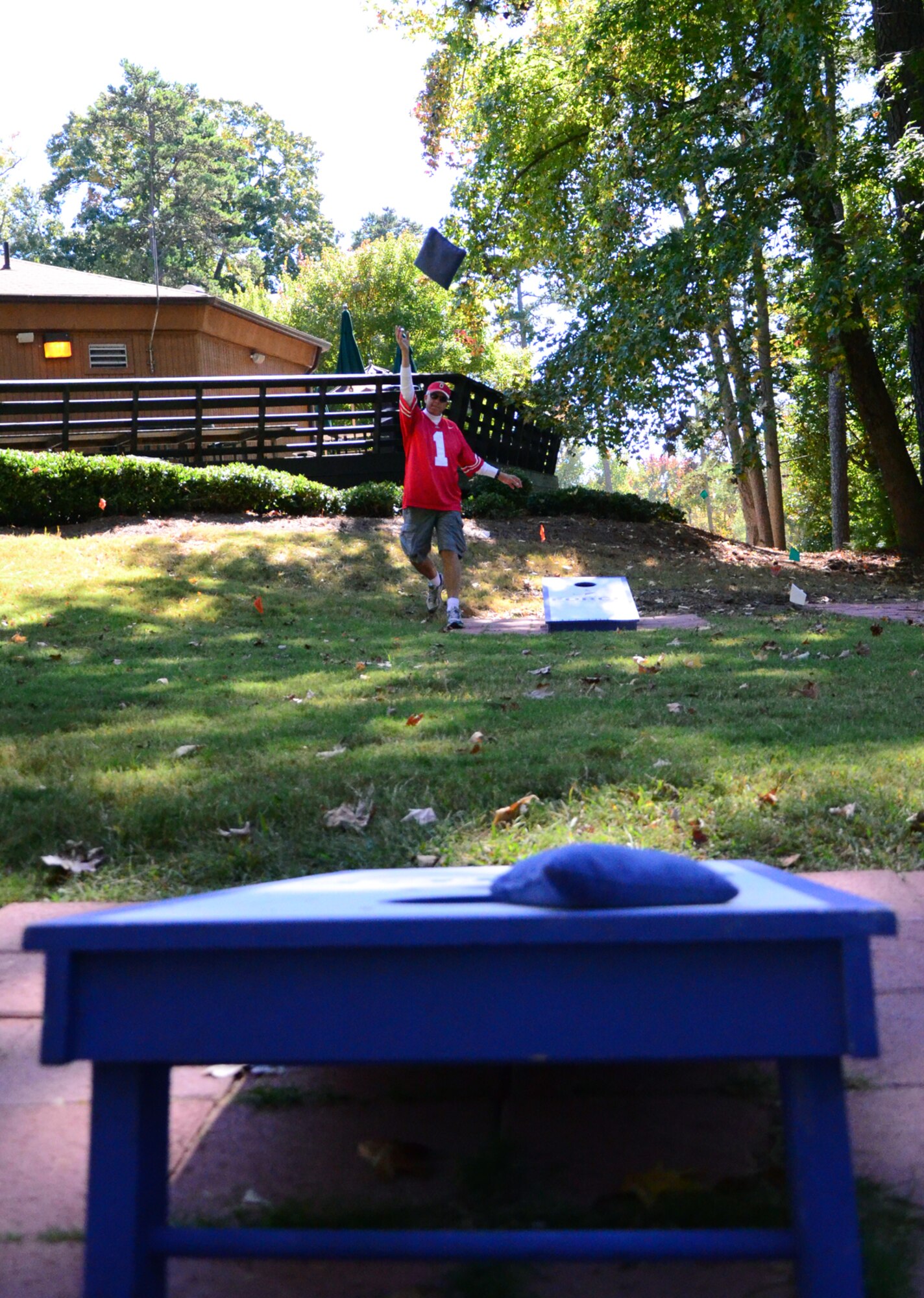 Col. Timothy E. Tarchick, 94th Airlift Wing commander, competes in the bag toss event at the Annual 94 AW Team Day held at Dobbins Air Reserve Base, Ga., Oct. 16. Team day is designed to promote team work and competitive spirit between units. (U.S. Air Force photo/ Senior Airman Elizabeth Van Patten)