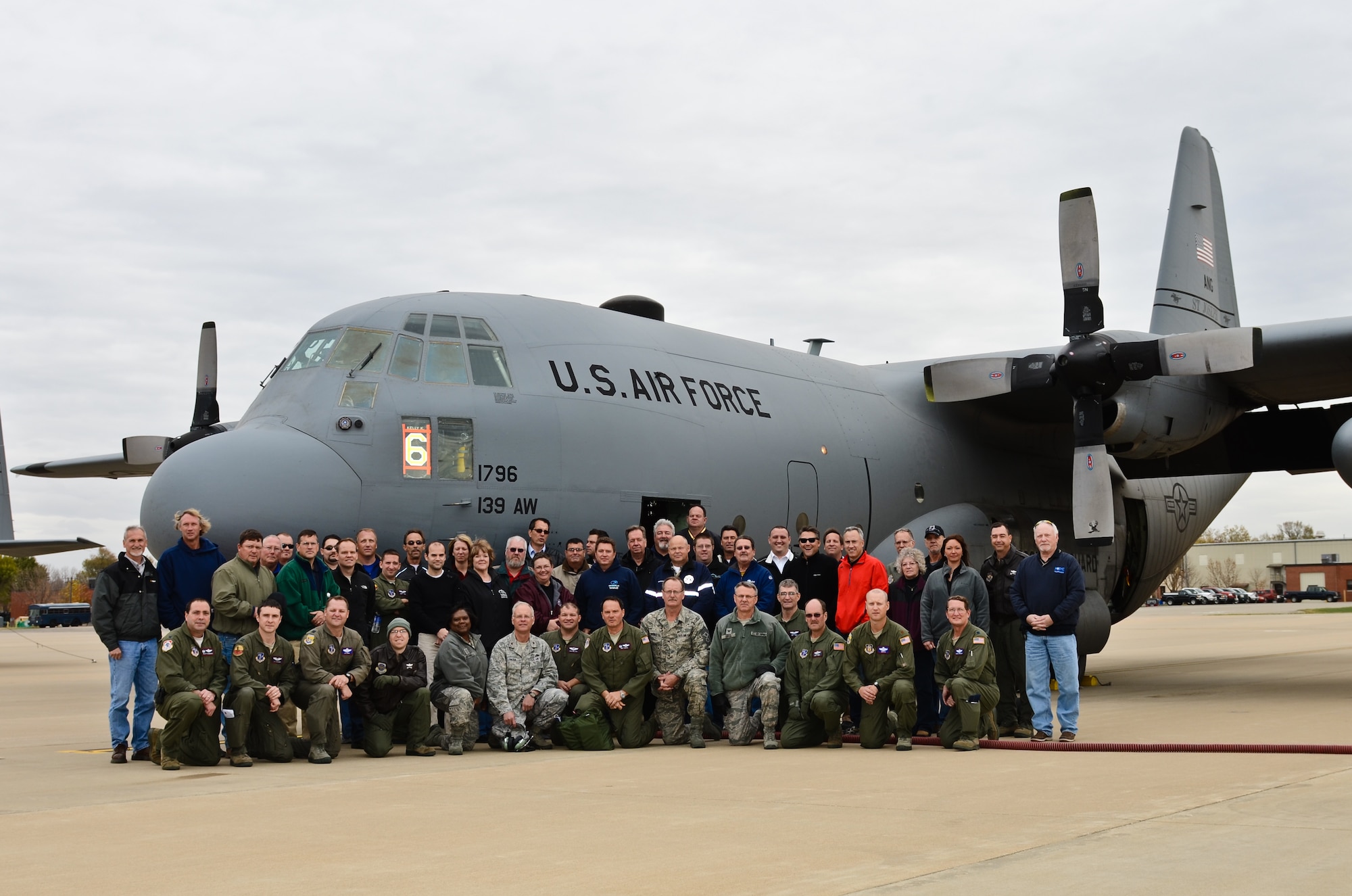 Various employers of National Guard members pose for a photo at Rosecrans Air National Guard Base, St. Joseph, Mo., Oct. 18, 2012. The employers received a flight in a C-130 “Hercules” cargo aircraft and an orientation about the mission of the 139th Airlift Wing. (Missouri Air National Guard photo by Staff Sgt. Michael Crane)