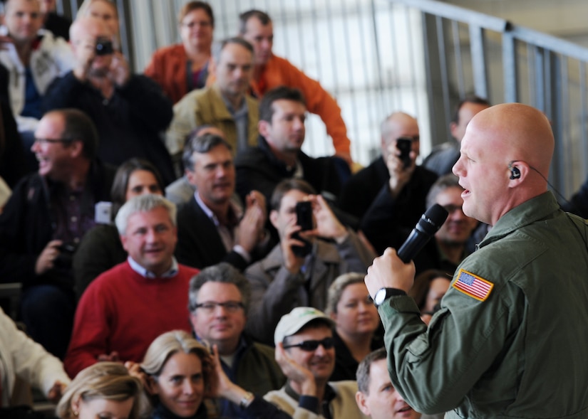 Master Sgt. Ryan Carson, U.S. Air Force Band Max Impact vocalist, performs for personnel from the Embassy of the Federal Republic of Germany in Washington D.C., during a tour to Joint Base Andrews, Md., Oct. 17, 2012. Max Impact is the premier rock band of the United States Air Force. The band's six members perform classic and current rock and country hits, as well as patriotic favorites and original music. (U.S. Air Force photo/ Staff Sgt. Nichelle Anderson)(Released)