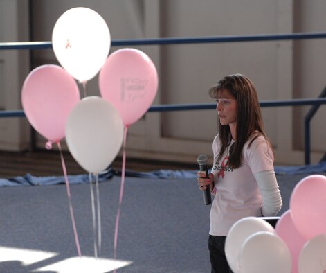 Breast cancer survivor, Corinna Andrews, shares her experience prior to the start of the Breast Cancer Awareness 5k at Ellsworth Air Force Base, S.D., on Oct. 12, 2012. Andrews explained the dramatic impact the disease made on her life, and the importance of regular self exams and early detection to preventing and treating breast cancer. (U.S. Air Force photo by Airman 1st Class Audra M. Hornbacher)