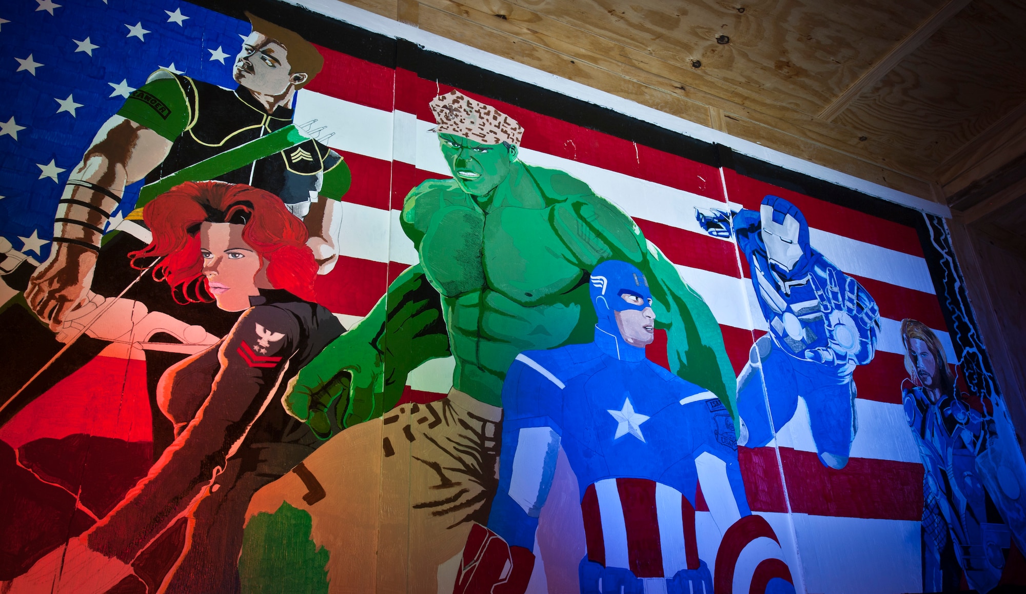 An "Avengers"-themed mural adorns the wall of the “Airman’s Attic” at Bagram Airfield, Afghanistan, Oct. 19, 2012. Staff Sgt. William Beal, assigned to 455th Expeditionary Logistics Readiness Squadron, volunteered his time and artistic talent to the Attic in order to add this special detail to the building. (U.S. Air Force Photo/Capt. Raymond Geoffroy)