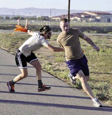 Military and civilians participated in the first March Field Zombie Run, Sunday, Oct. 14, 2012. The run was sponsored by the 452nd Air Mobility Wing Rising Six organization to raise money for junior enlisted ranks to attend the Military Ball. (U.S. Air Force photo by Master Sgt. Linda Welz)