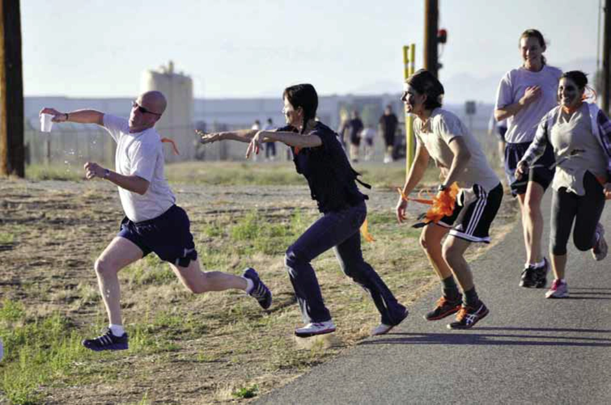 Military and civilians participated in the first March Field Zombie Run, Sunday, Oct. 14, 2012. The run was sponsored by the 452nd Air Mobility Wing Rising Six organization to raise money for junior enlisted ranks to attend the Military Ball. (U.S. Air Force photo by Master Sgt. Linda Welz)