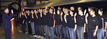 Col. Samuel Mahaney, base commander, March Air Reserve Base, administers the Oath of Enlistment to several men and women in the Delayed Enlistement Program in front of a static SR-71 Blackbird at the March Field Air Museum Oct. 11, 2012. March recruiters coordinate a mass enlistment each year as part of their recruiting program guidelines. (U.S. Air Force photo by Master Sgt. Linda Welz)