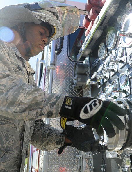 Staff Sgt. Artice Melvin  a firefighter from the 375th Civil Engineer Squadron
enables combat power by providing dedicated support to the base population and maintaining the equipment to fight fires. (U.S. Air Force photo/ Senior Airman Tristin English)
