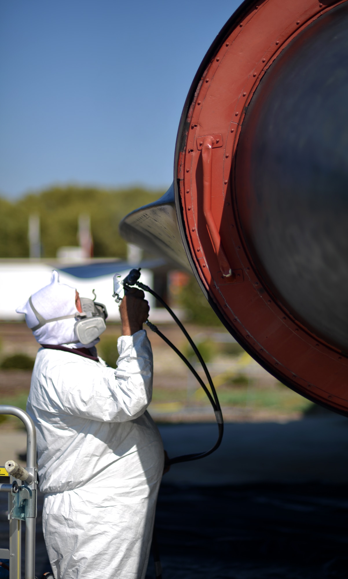 Rick Ashcraft paints the SR-71 Blackbird static display at Heritage Park, Beale Air Force Base, Calif., Sept. 29, 2012. The first Blackbird arrived at Beale in January 1966 and stayed until it was decommissioned Jan. 26, 1990. (U.S. Air Force photo by Airman 1st Class Andrew Buchanan)