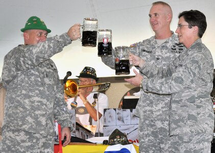 (From left) 502nd Mission Support Group Command Sgt. Maj. Donald J. Freeman, 502nd Mission Support Group Commander Col. John Lamoureux and Brig. Gen. Theresa C. Carter, commander, 502nd Air Base Wing and Joint Base San Antonio, toast to Oktoberfest 2012. (Photo by Deyanira Romo Rossell, 502nd Force Support Squadron Marketing)