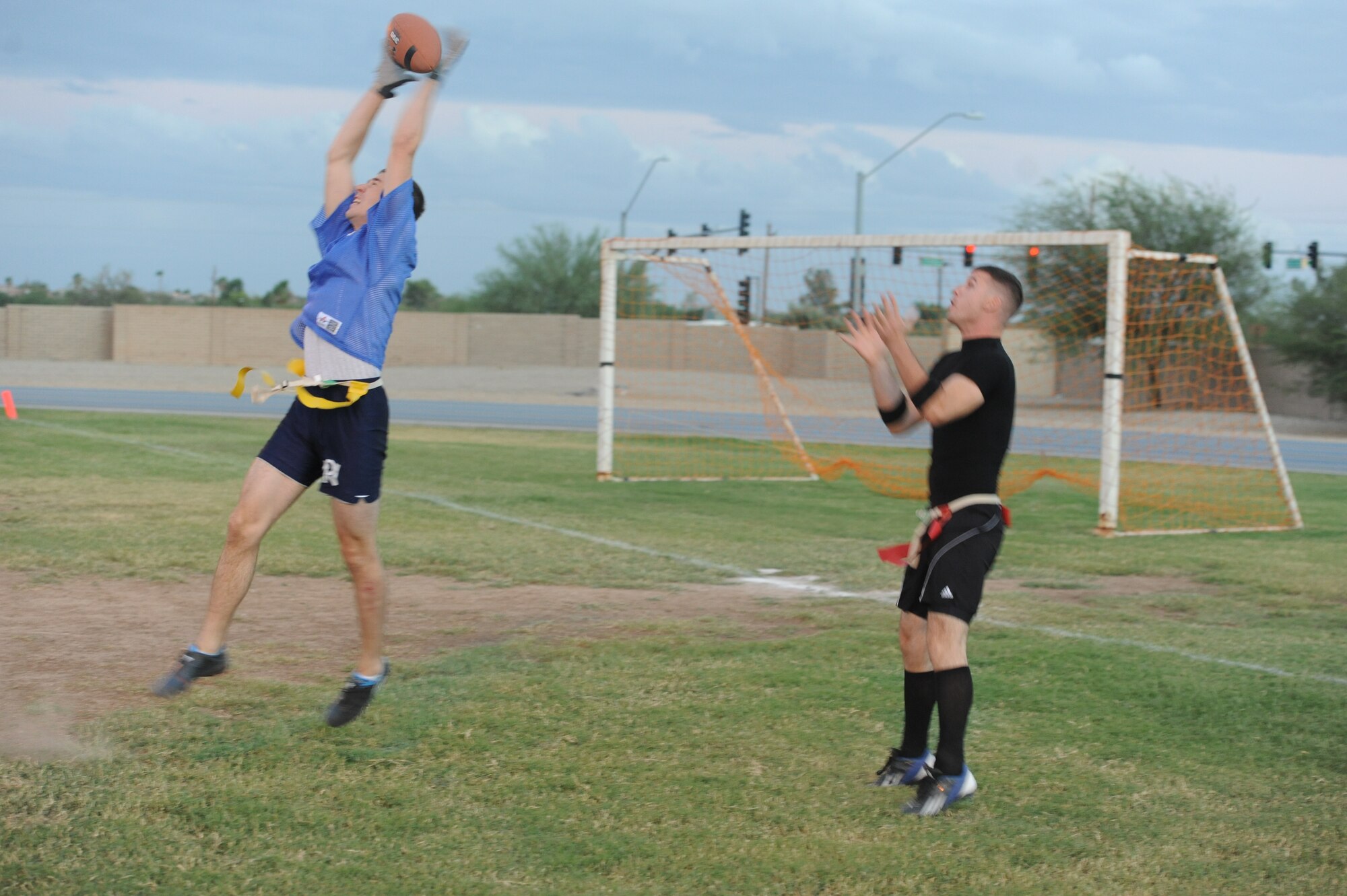 Derek Zimmer, 56th Communications Squadron, intercepts the ball Oct. 11 during the intramural flag football championship game against the 607th Air Control Squadron. The 607th defeated the CS by a final score of 19-6. (U.S. Air Force photo by Airman 1st Class Devante Williams)