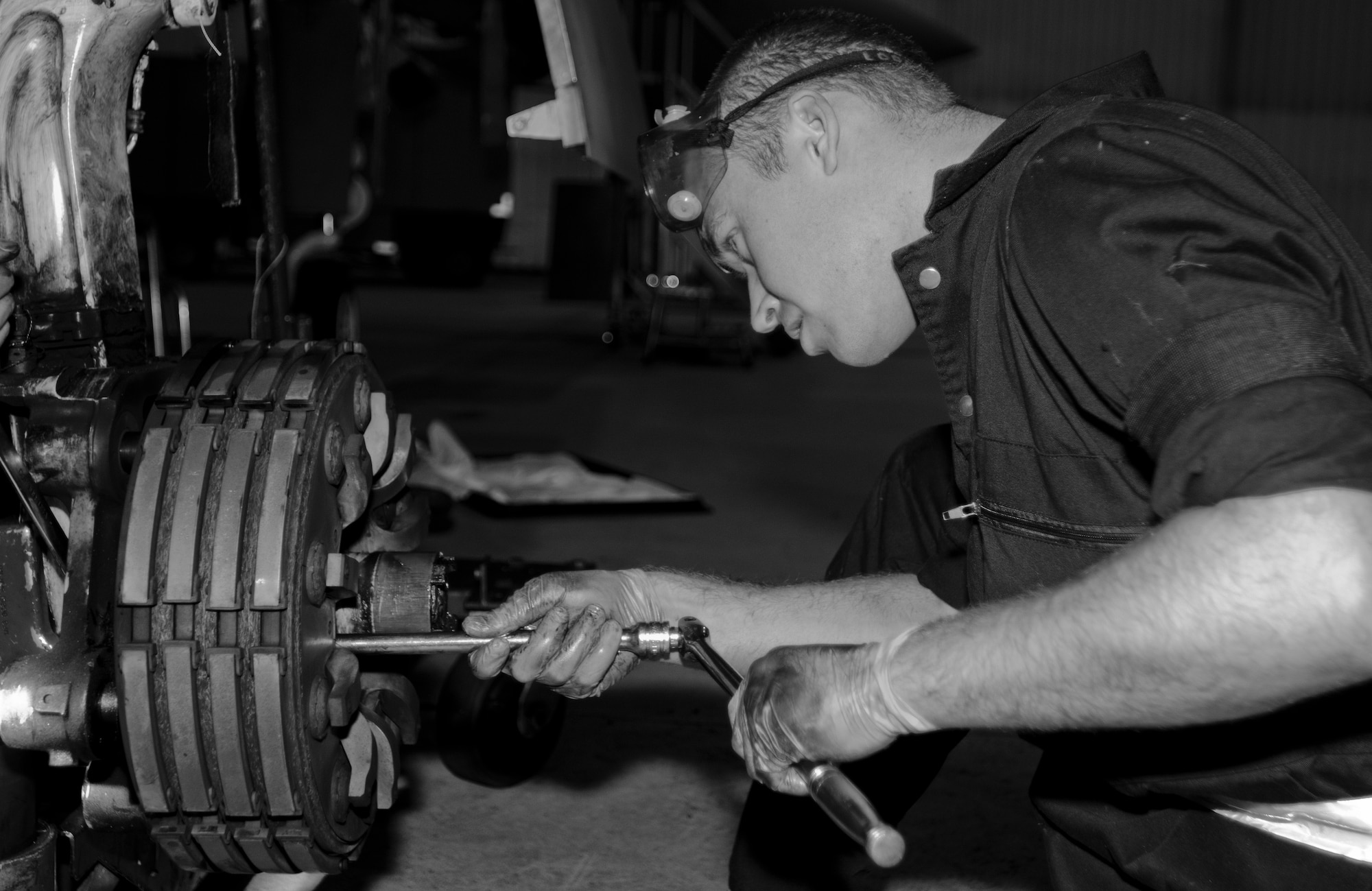 ROYAL AIR FORCE LAKENHEATH, England - Airman 1st Class Jory Kaiser, 48th Equipment Maintenance Squadron inspection section apprentice and native of Clover S.C., works to remove a brake from an F-15C Eagle Oct. 17, 2012. The F-15C Eagle is an all-weather, extremely maneuverable, tactical fighter designed to permit the Air Force to gain and maintain air supremacy over the battlefield. (U.S. Air Force Photo by Staff Sgt. Stephen Linch)