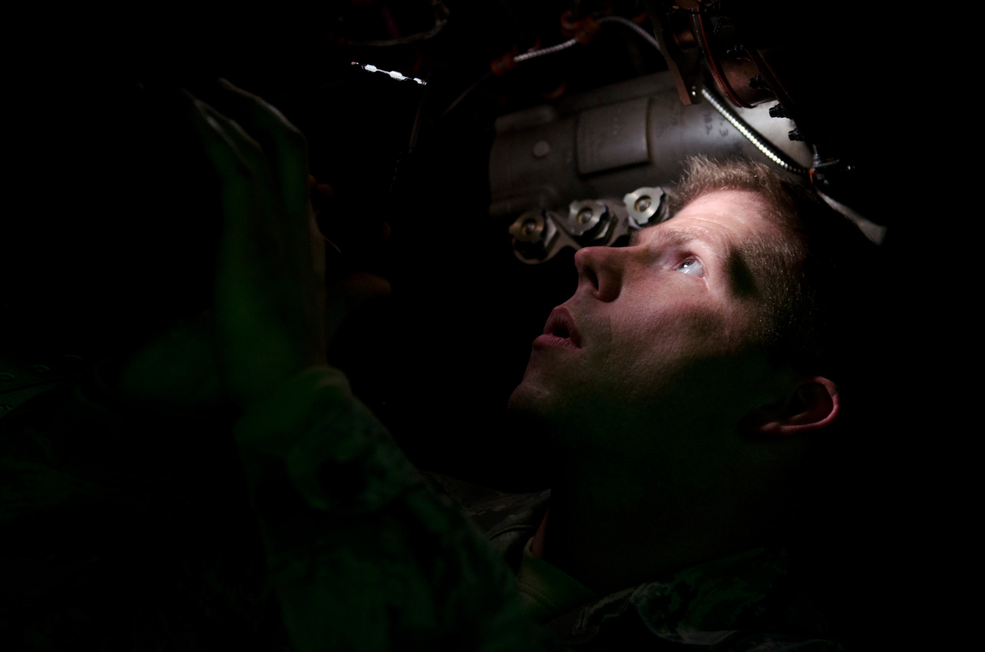 ROYAL AIR FORCE LAKENHEATH, England - Staff Sgt. Andrew Kessler, 48th Equipment Maintenance Squadron aerospace propulsion craftsman and native of Charlotte, N.C., inspects one of the engines of an F-15C Eagle Oct. 16, 2012. This aircraft was turned over to the 48th EMS for 10 days of phase maintenance. During the maintenance, the 48th EMS Airmen essentially reverse 400 flight hours of wear and tear. (U.S. Air Force Photo by Staff Sgt. Stephen Linch)