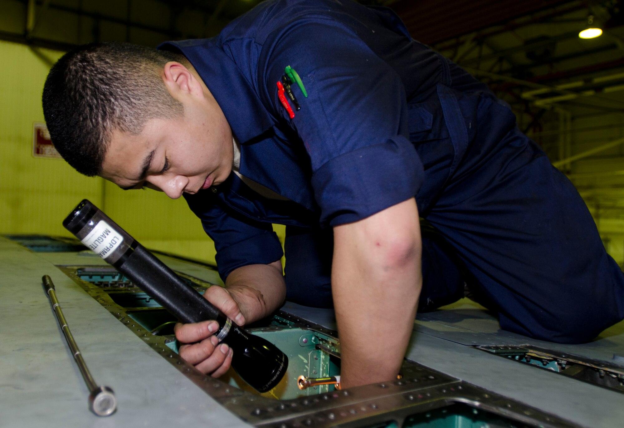 ROYAL AIR FORCE LAKENHEATH, England - Senior Airman Dustin Draper, 48th Equipment Maintenance Squadron inspection section journeyman and native of Chambersburg, Pa., inspects the interior structure of an F-15C Eagle Oct. 16, 2012. Airmen from the 48th EMS inspect, restore and upgrade aircraft during a 10-day maintenance process known as phase maintenance. (U.S. Air Force Photo by Staff Sgt. Stephen Linch)